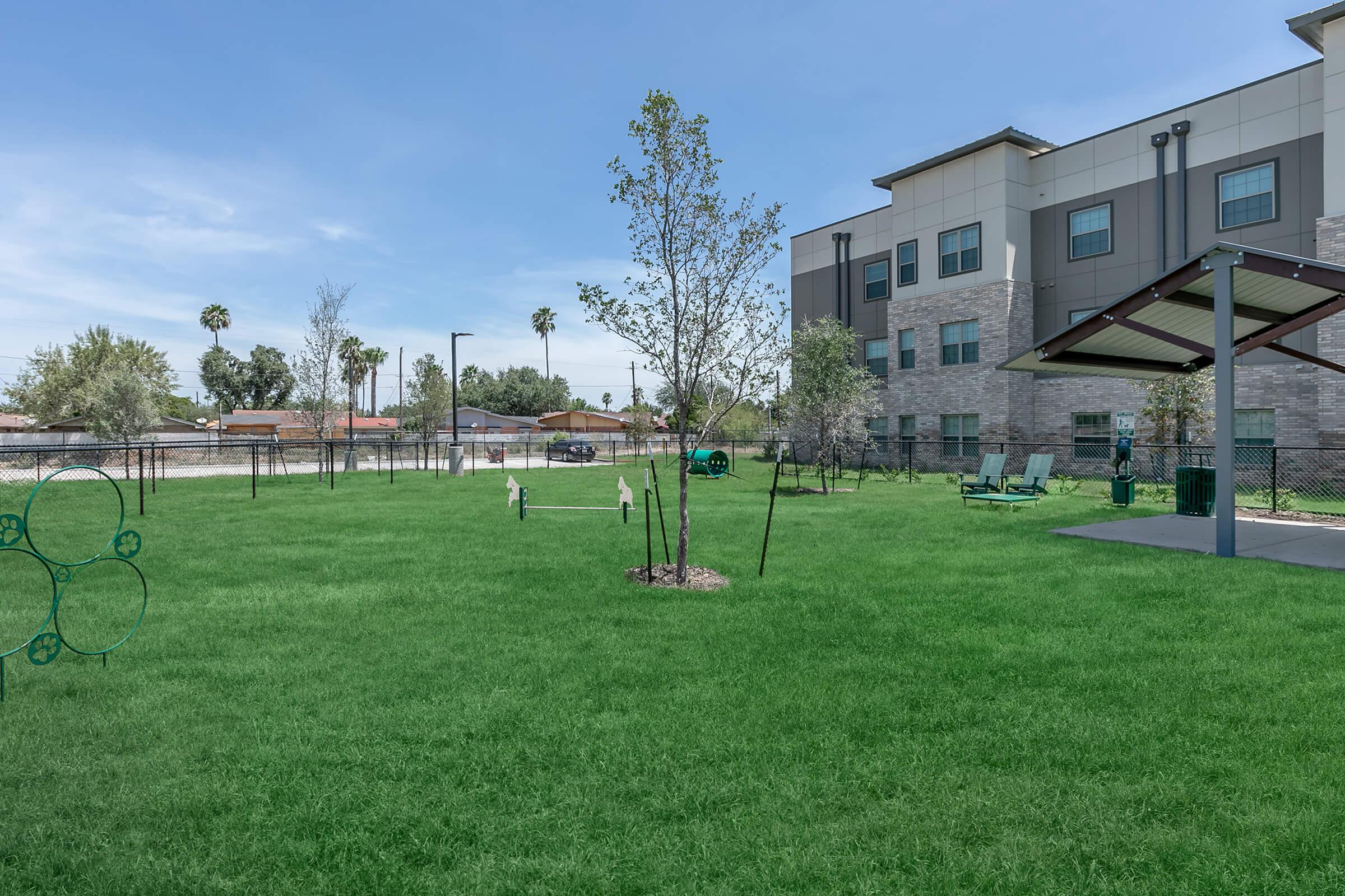 a large lawn in front of a building