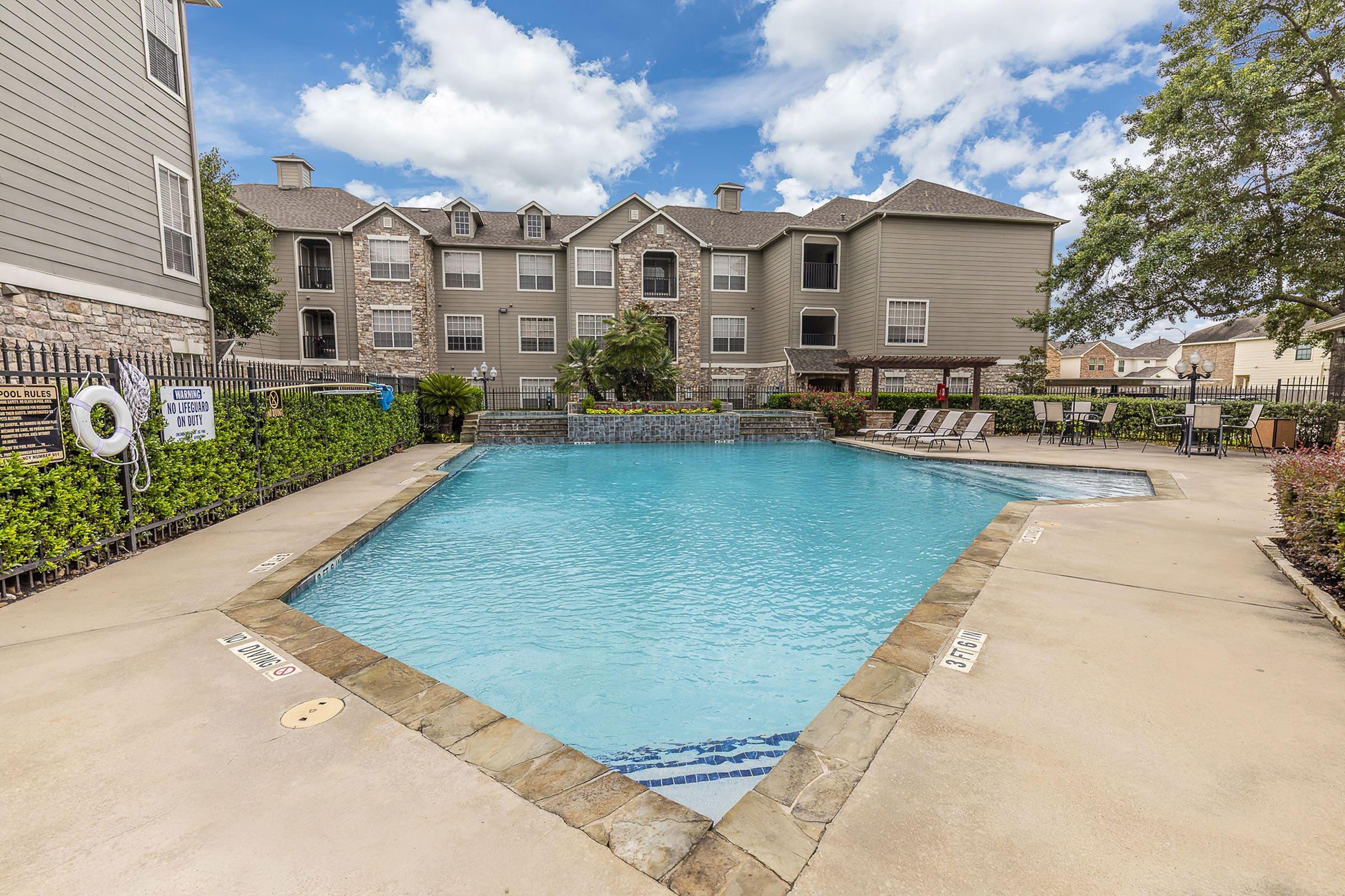 a pool of water in front of a building