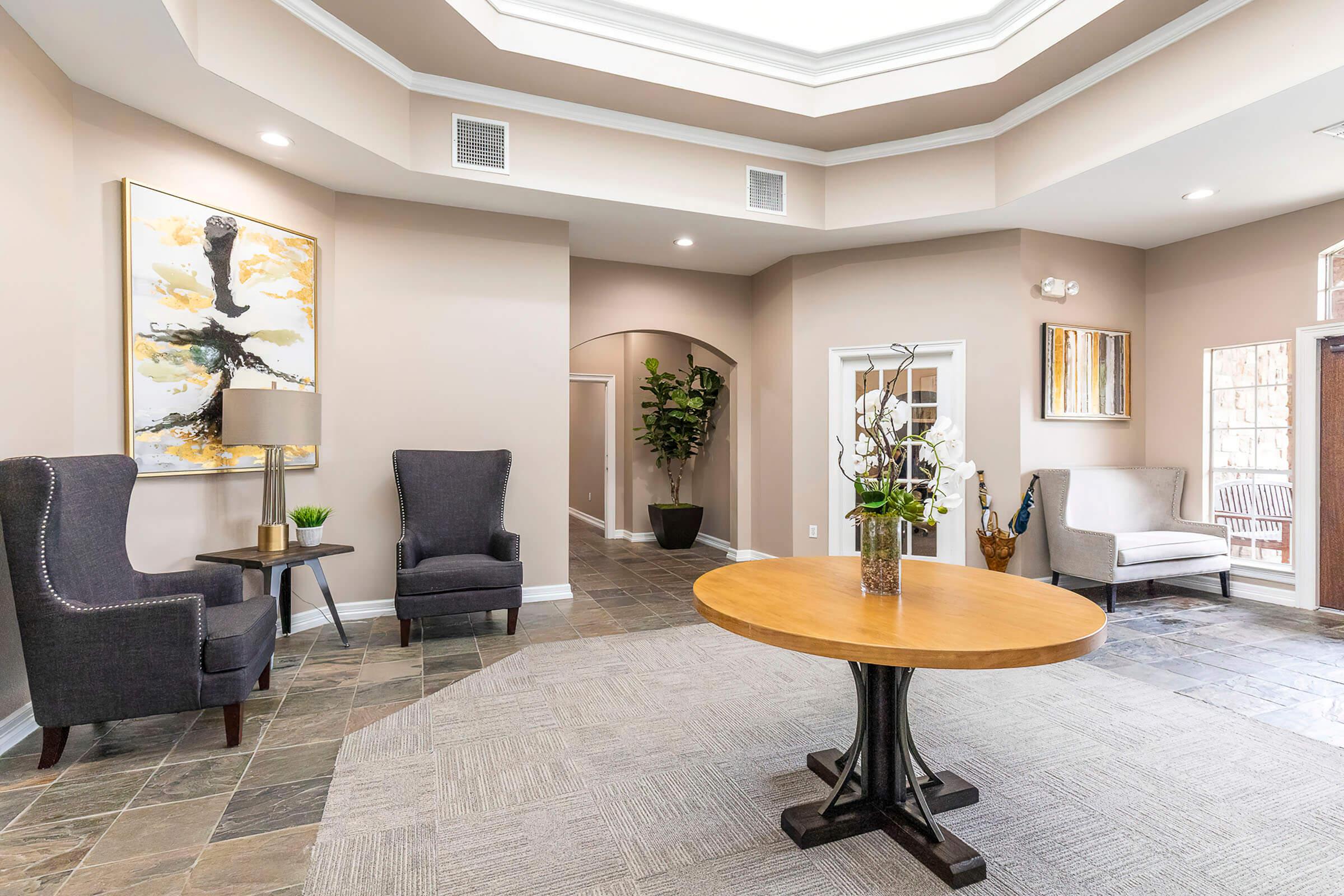 a living room filled with lots of furniture