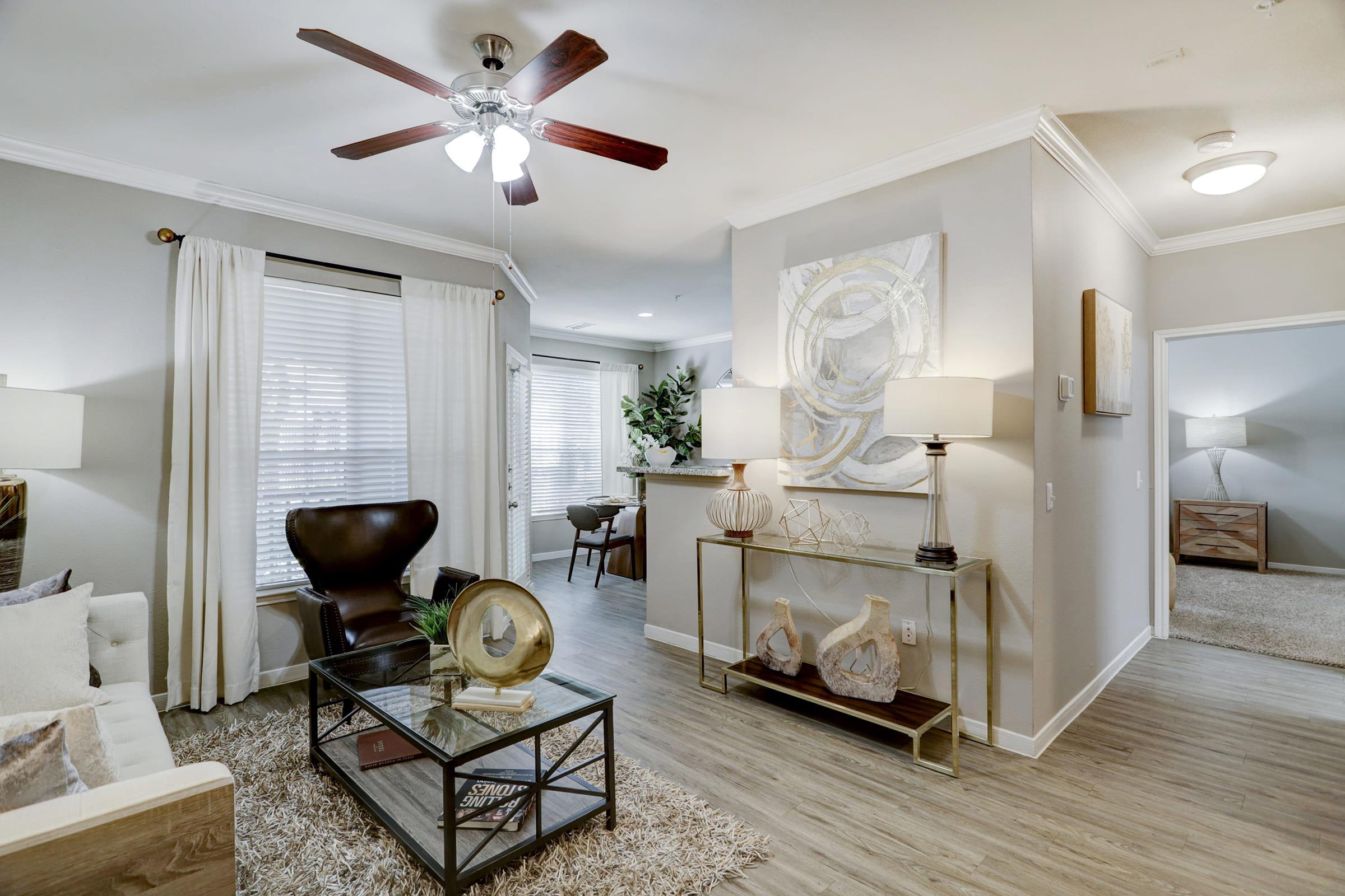 a living room filled with furniture and a fireplace