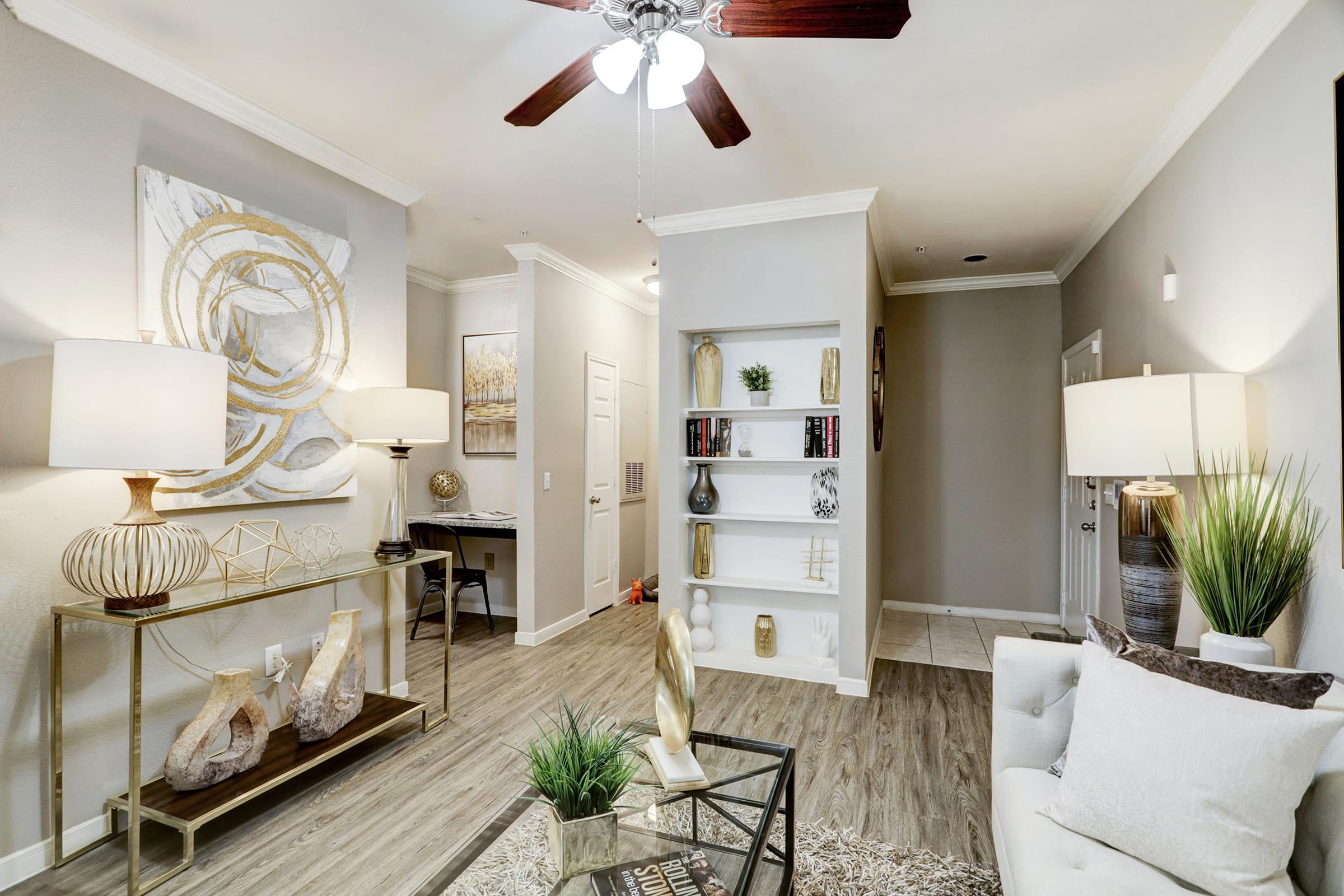 a living room filled with furniture and a fireplace