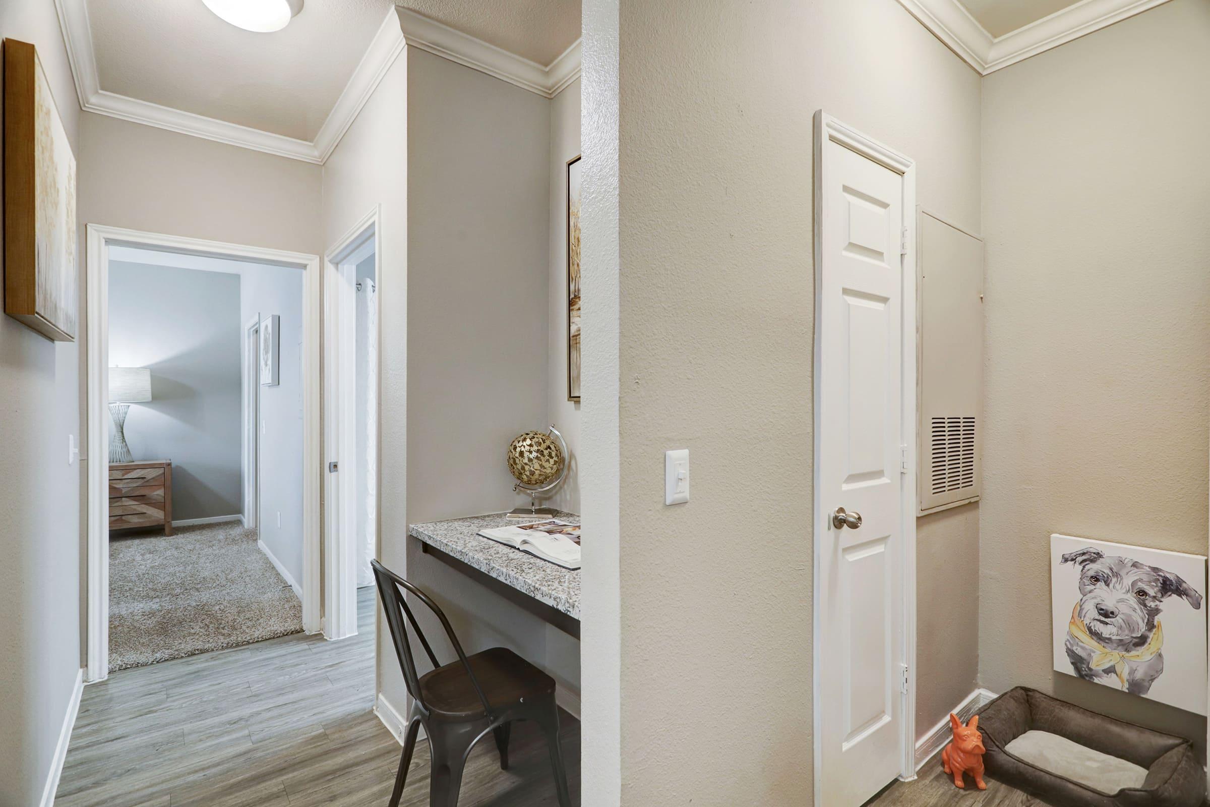 a room with a sink and a mirror