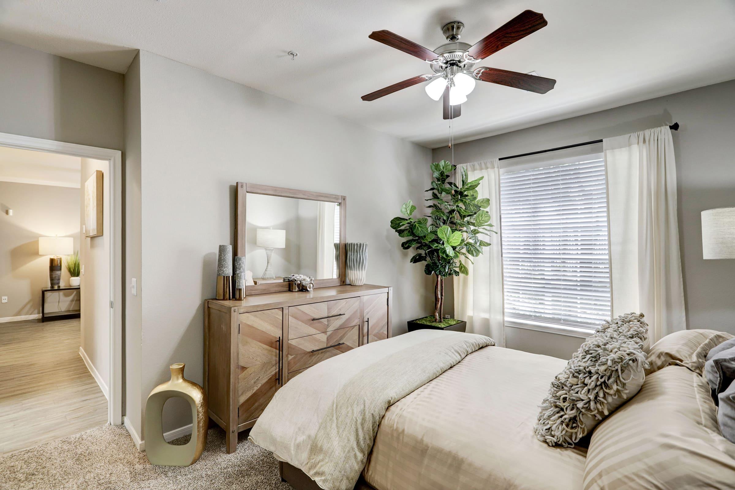 a bedroom with a large bed in a room