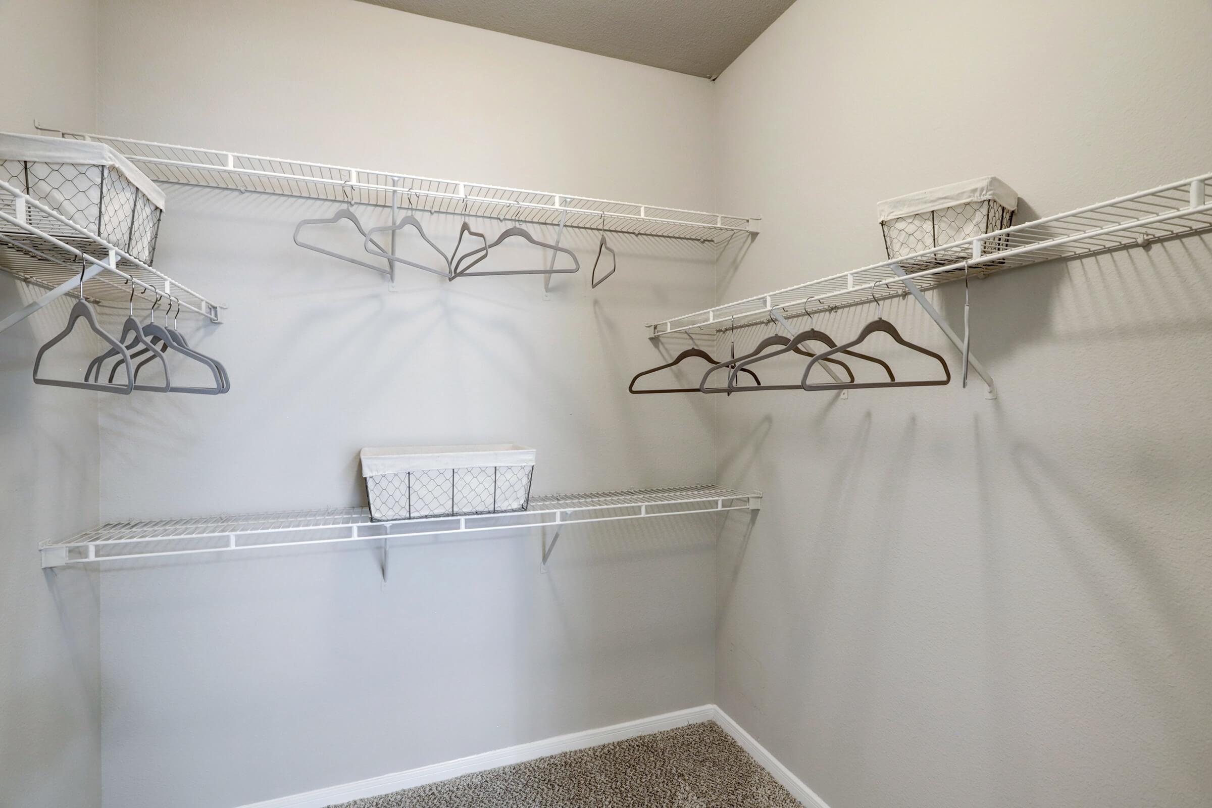 a shower with a metal rack
