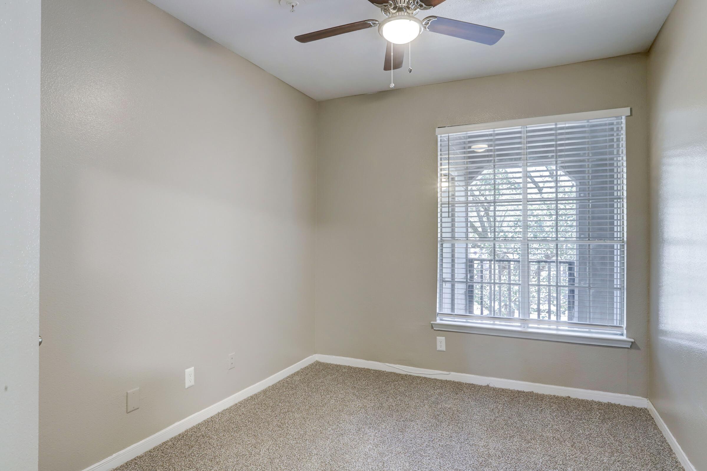 a room with a sink and a window