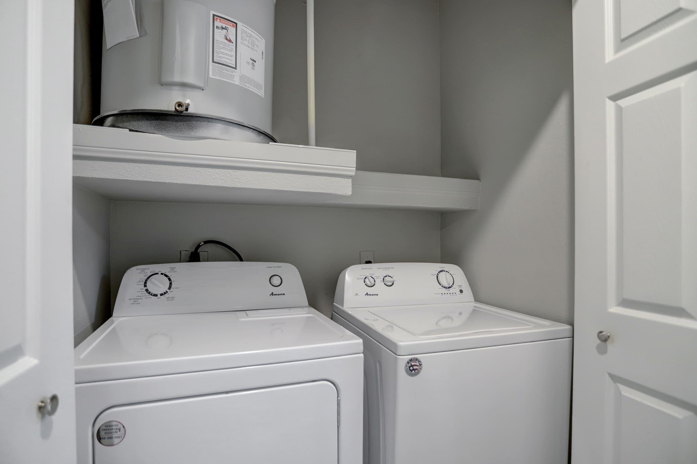 a kitchen with a sink and a refrigerator