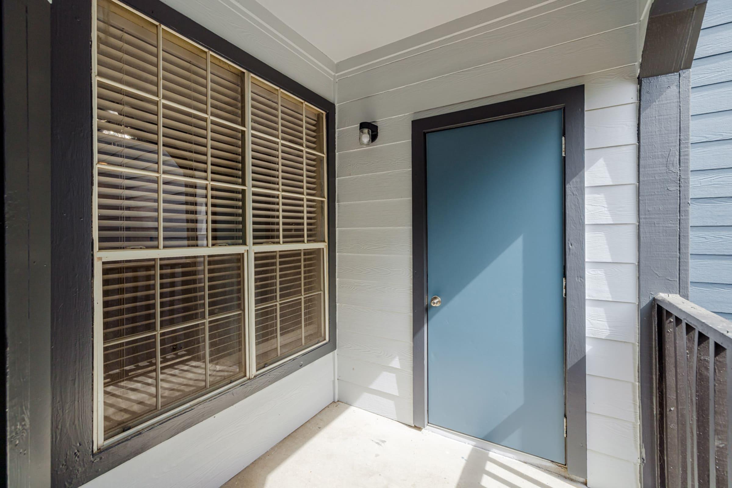 a glass door on the side of a building