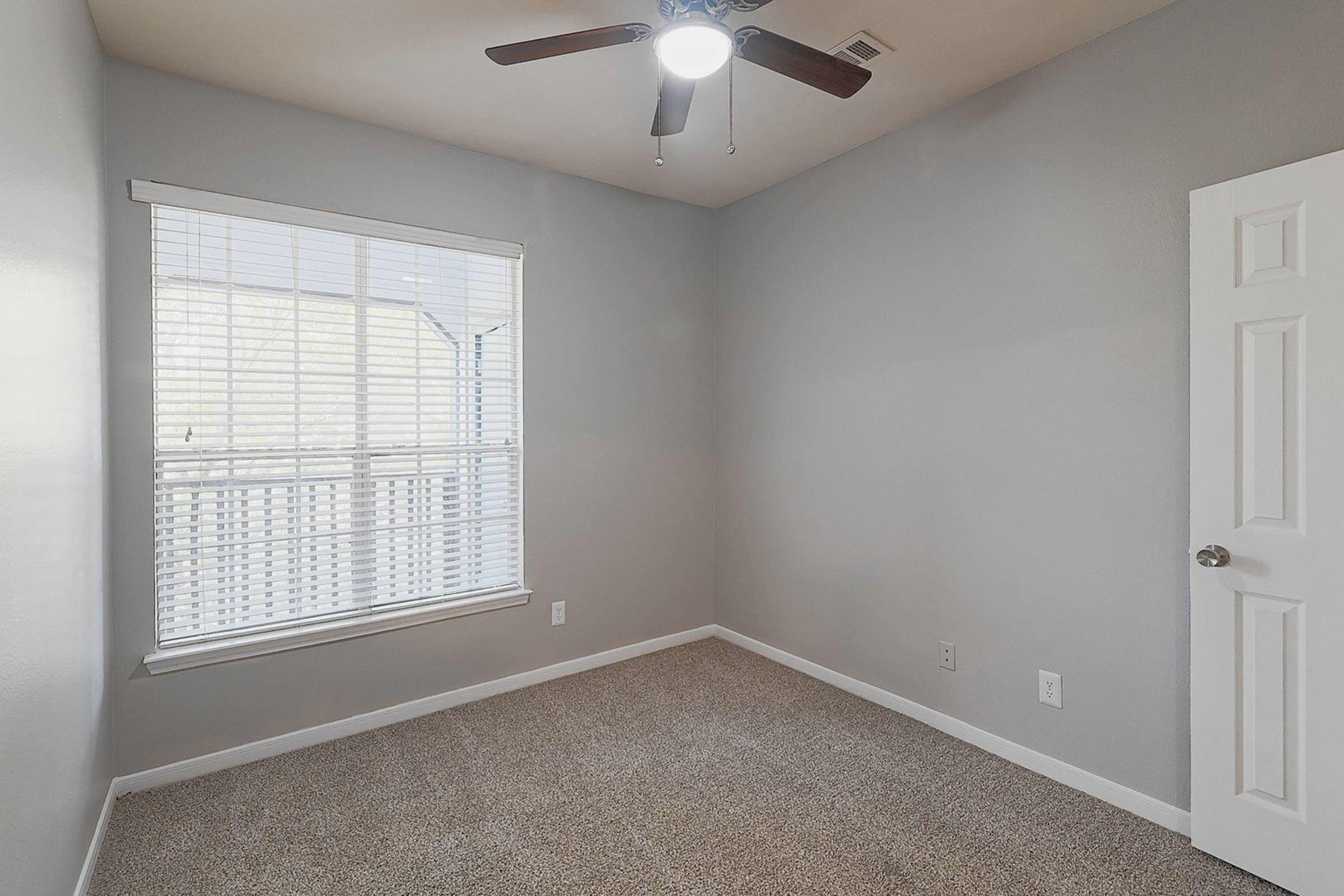 a room with a sink and a window