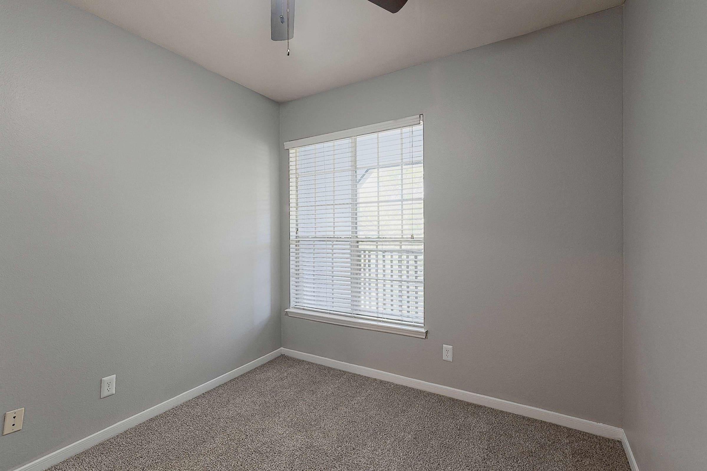 a room with a sink and a window