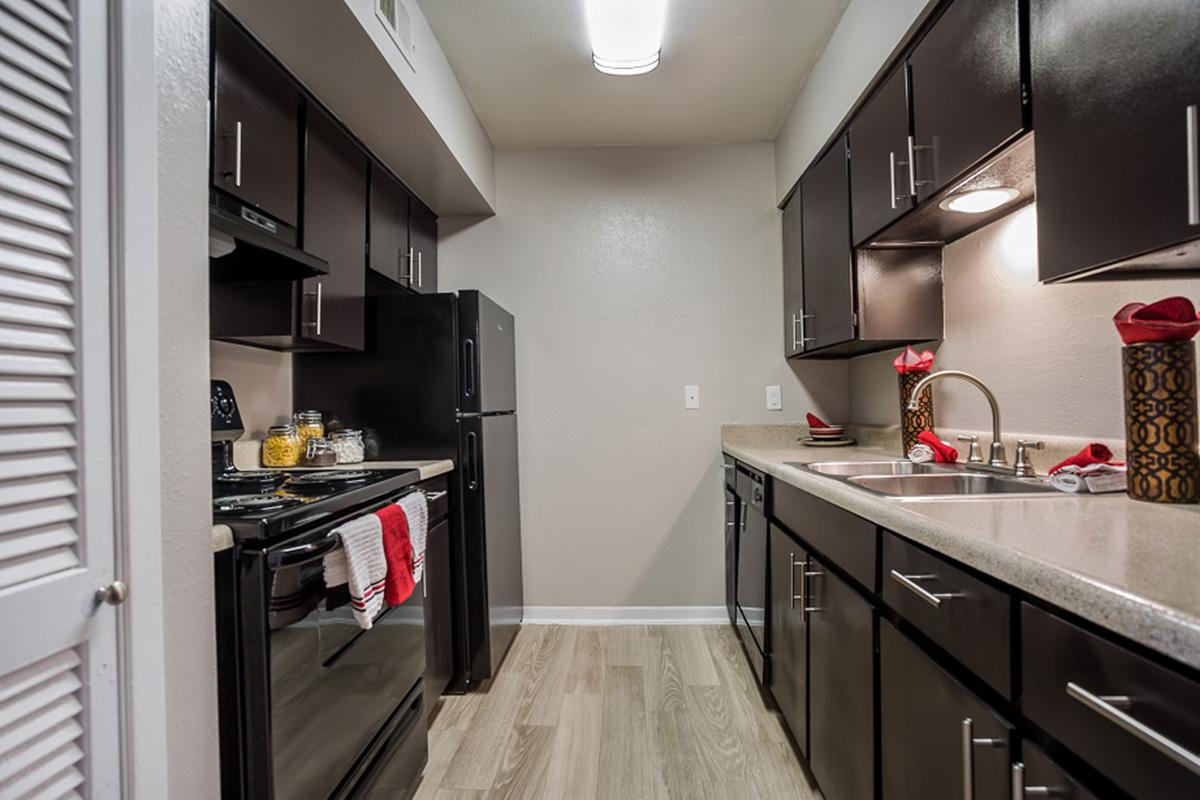 a modern kitchen with stainless steel appliances