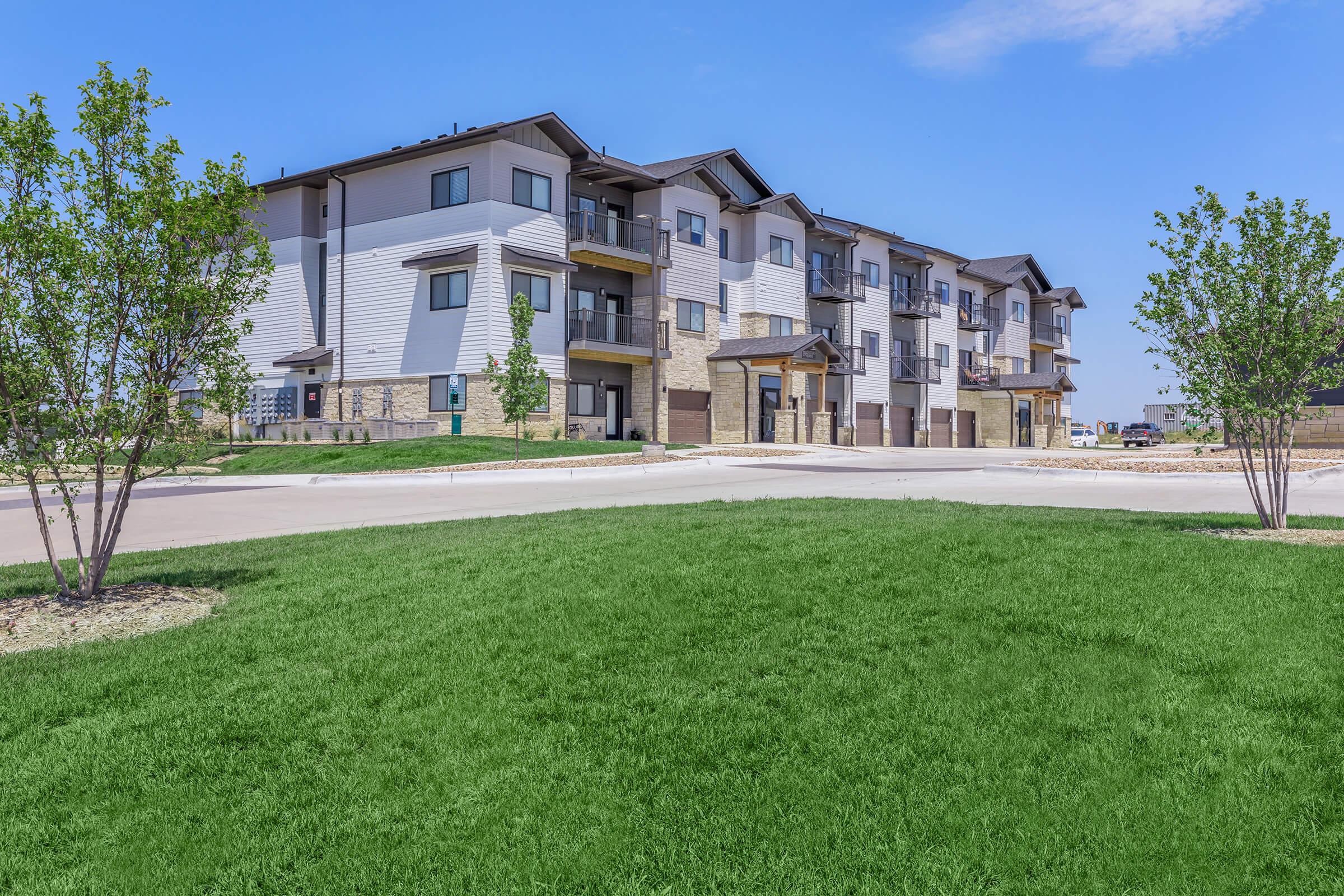 a large lawn in front of a house