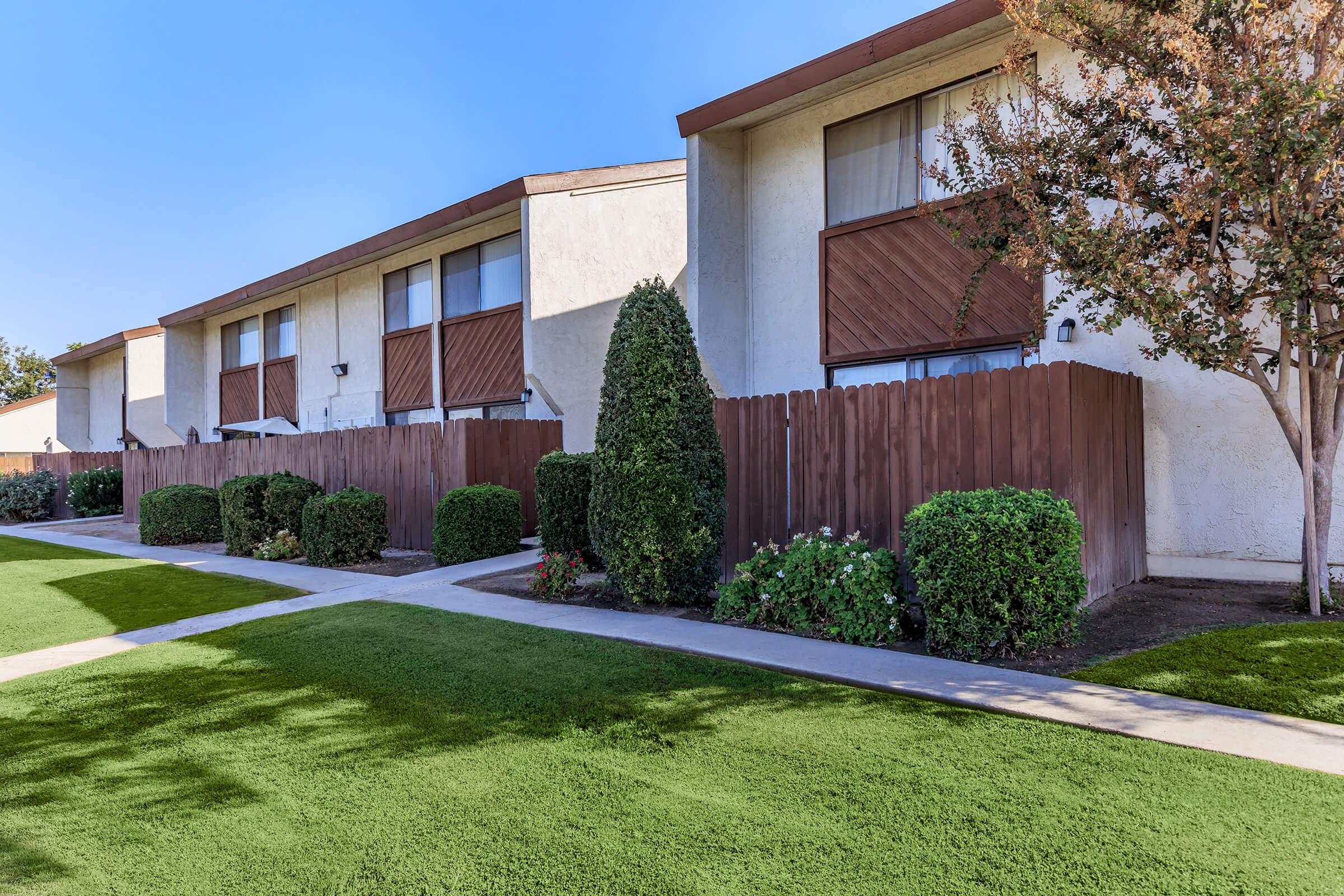 a large lawn in front of a house