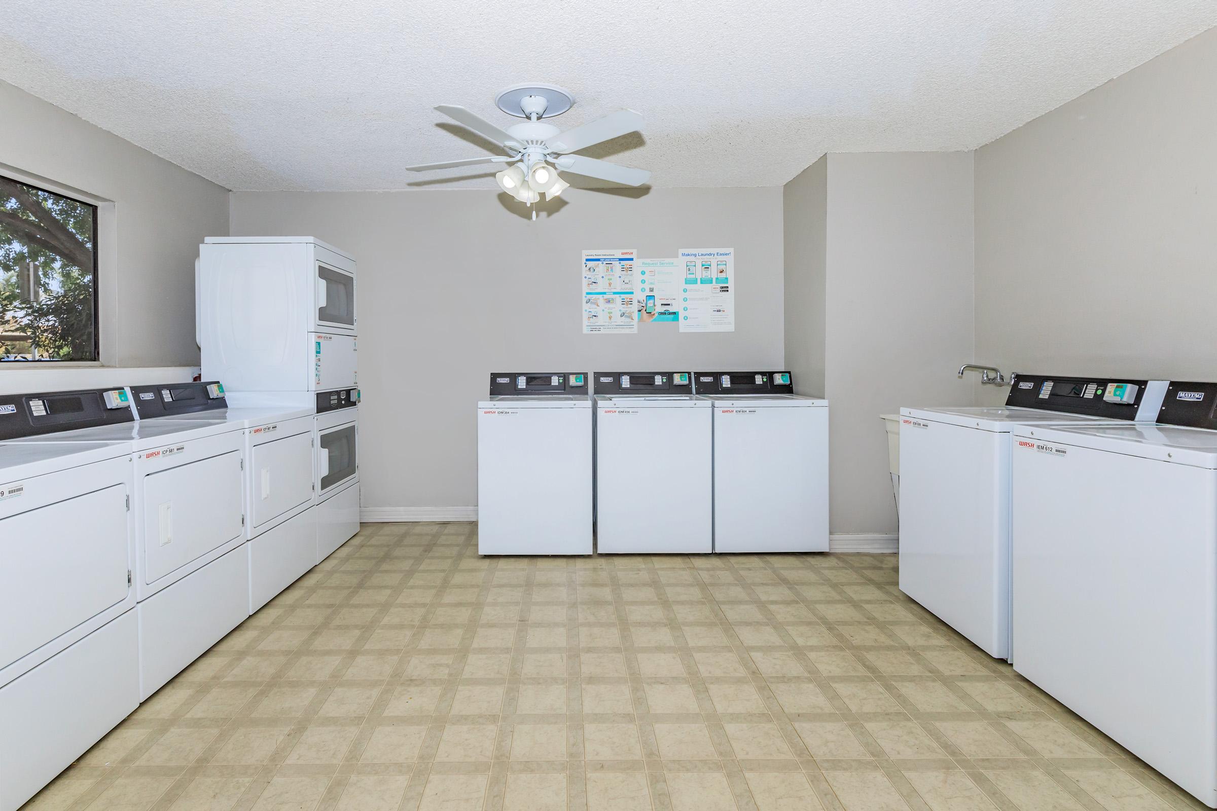 a kitchen with a sink and a refrigerator