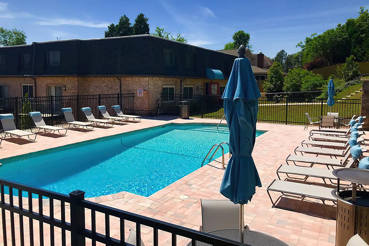 a pool next to a fence