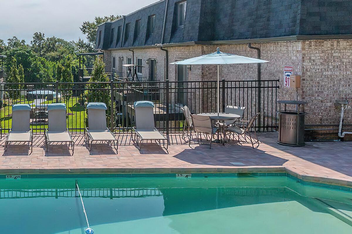 a pool next to a building