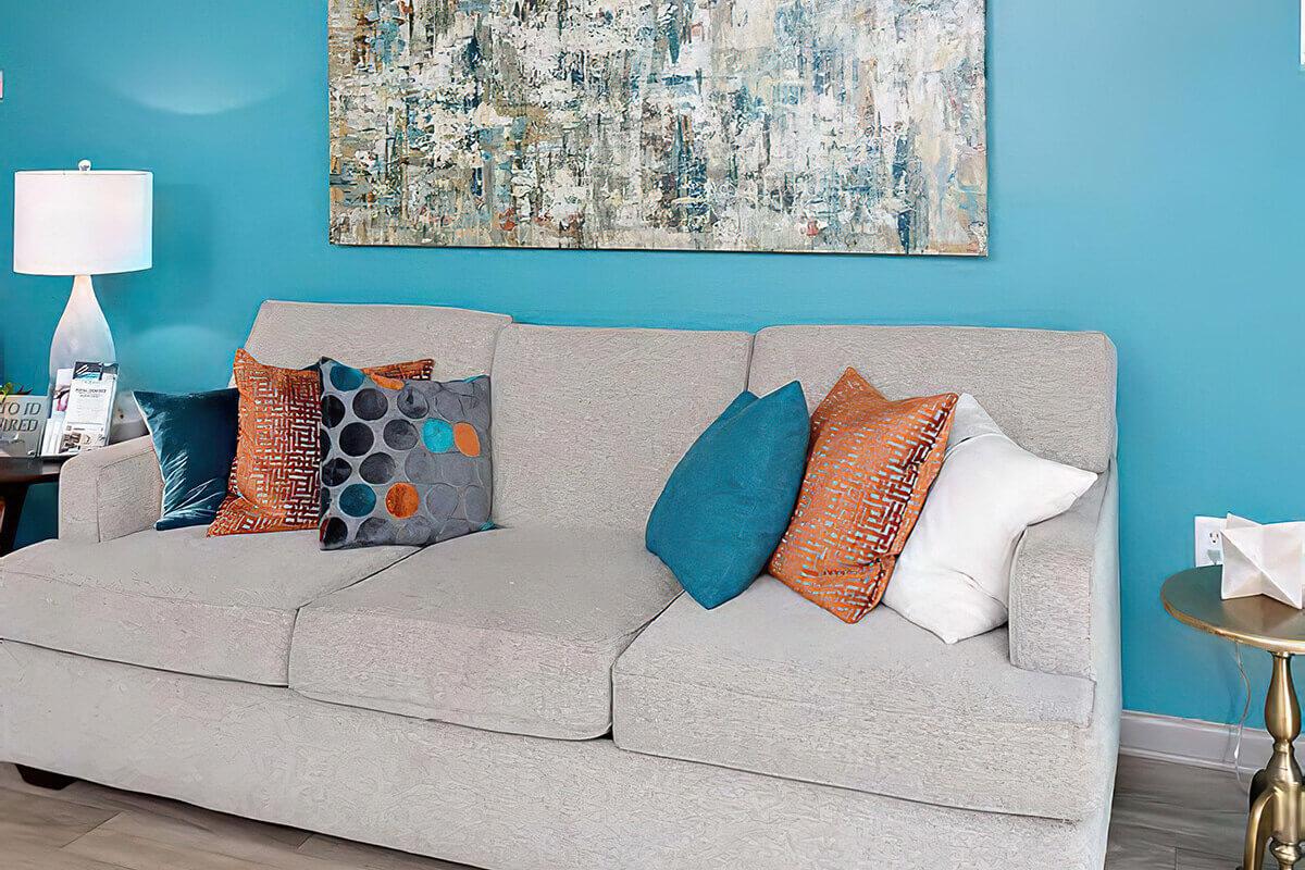a painting of a living room
