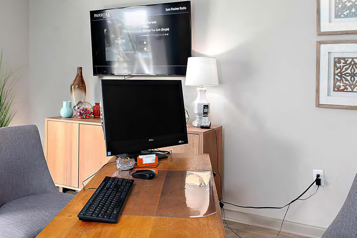a desktop computer sitting on top of a table