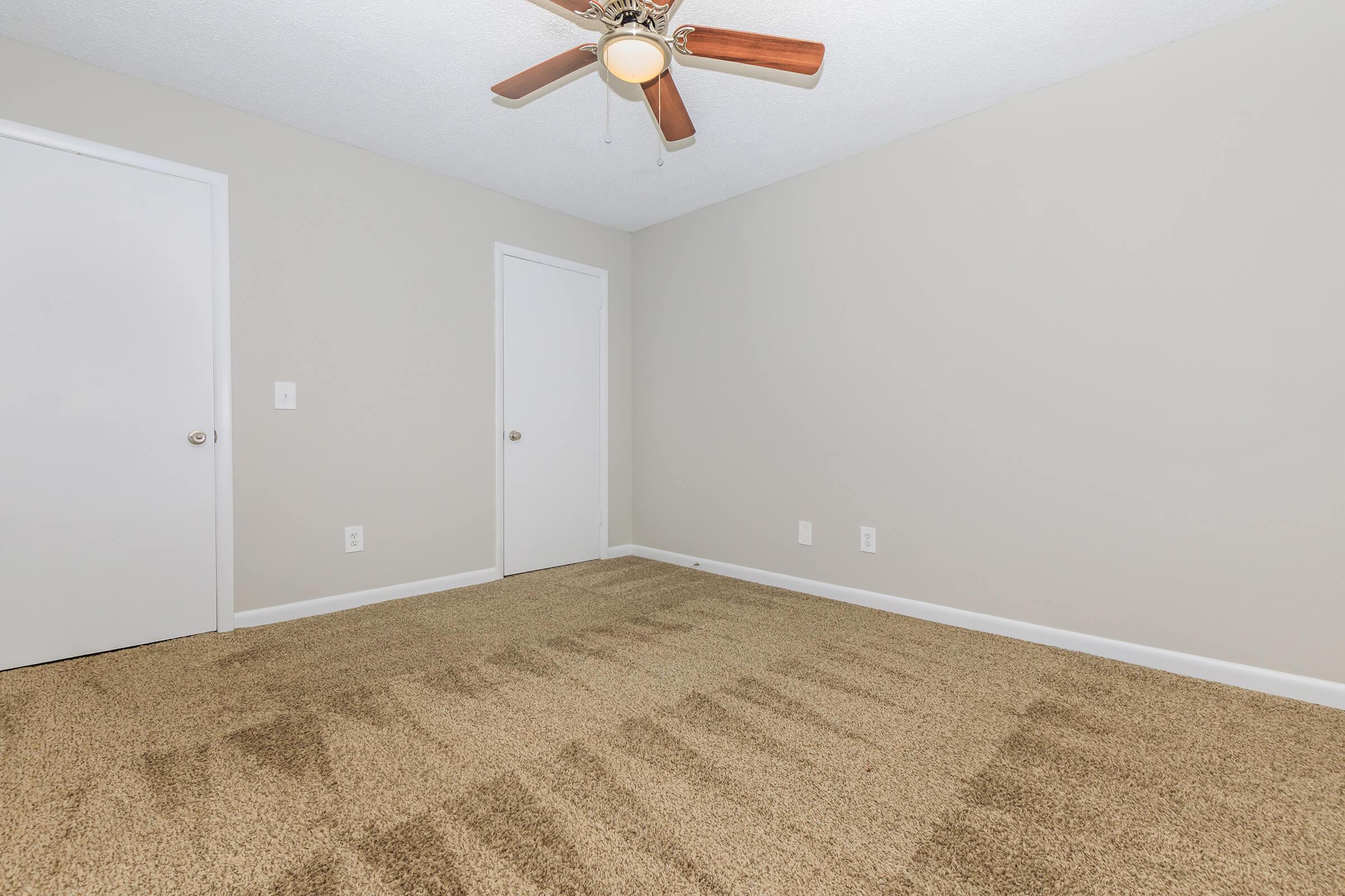COMFORTABLE BEDROOM WITH PLUSH CARPETING