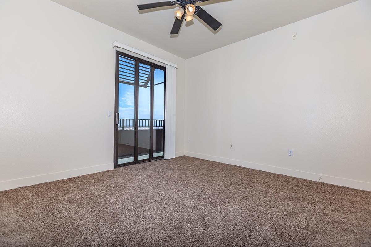 ECHELON AT CENTENNIAL HILLS IN LAS VEGAS HAS CEILING FANS AND CARPETED FLOORS