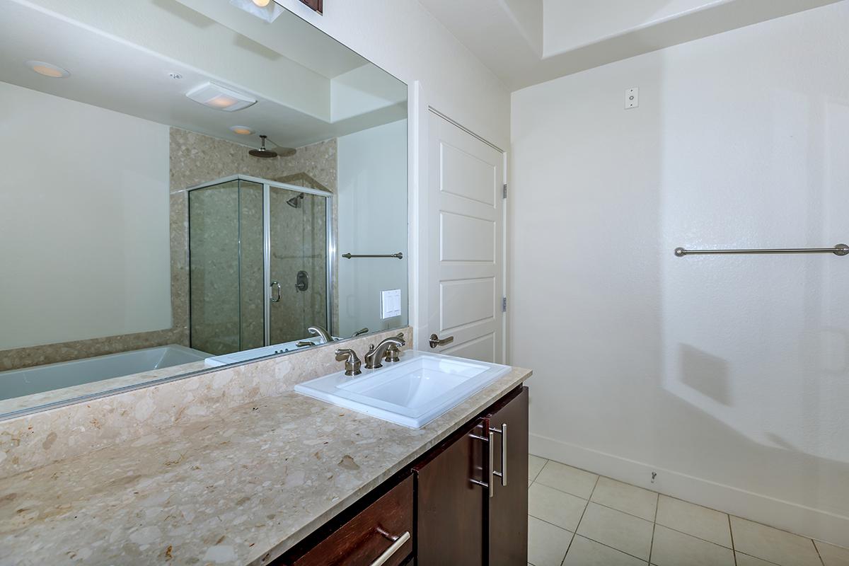 TILED BATHROOMS WITH DESIGNER FIXTURES AT ECHELON AT CENTENNIAL HILLS IN LAS VEGAS