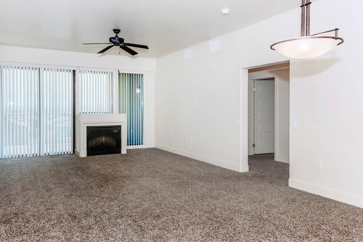FIREPLACE, CEILING FANS, AND CARPETED FLOORS AT ECHELON AT CENTENNIAL HILLS IN LAS VEGAS