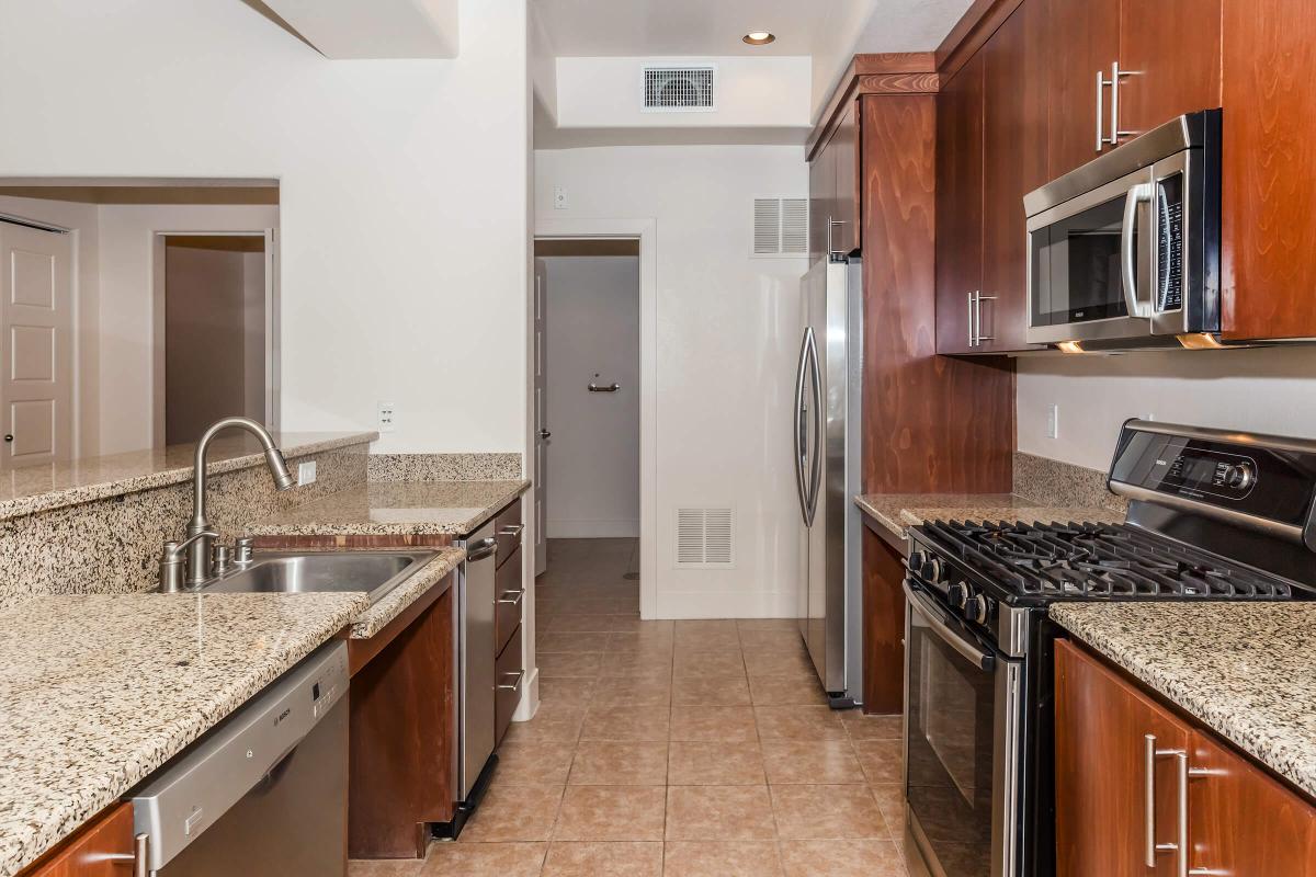 a modern kitchen with stainless steel appliances