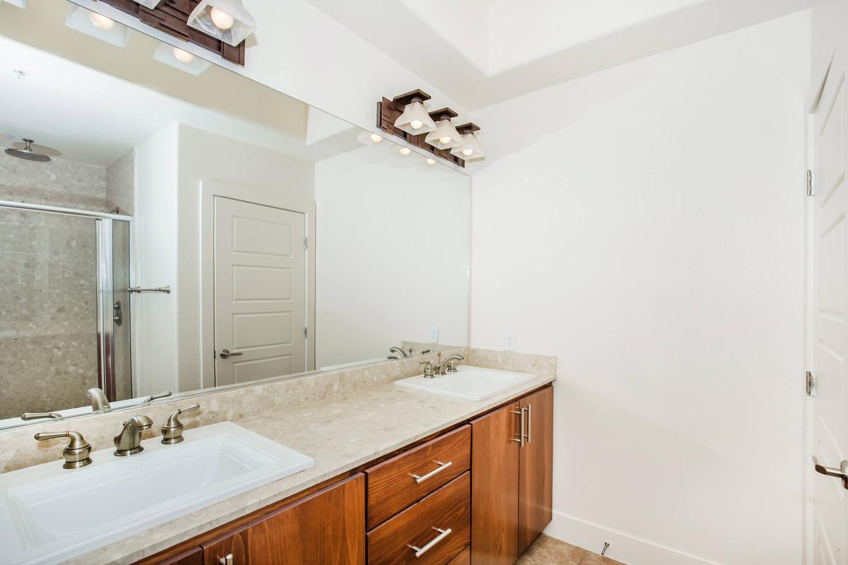 TILED BATHROOMS WITH DESIGNER FIXTURES AT ECHELON AT CENTENNIAL HILLS IN LAS VEGAS