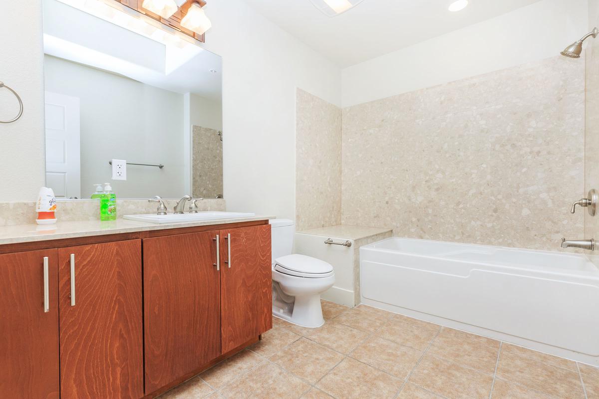 TILED BATHROOMS WITH DESIGNER FIXTURES AT ECHELON AT CENTENNIAL HILLS IN LAS VEGAS