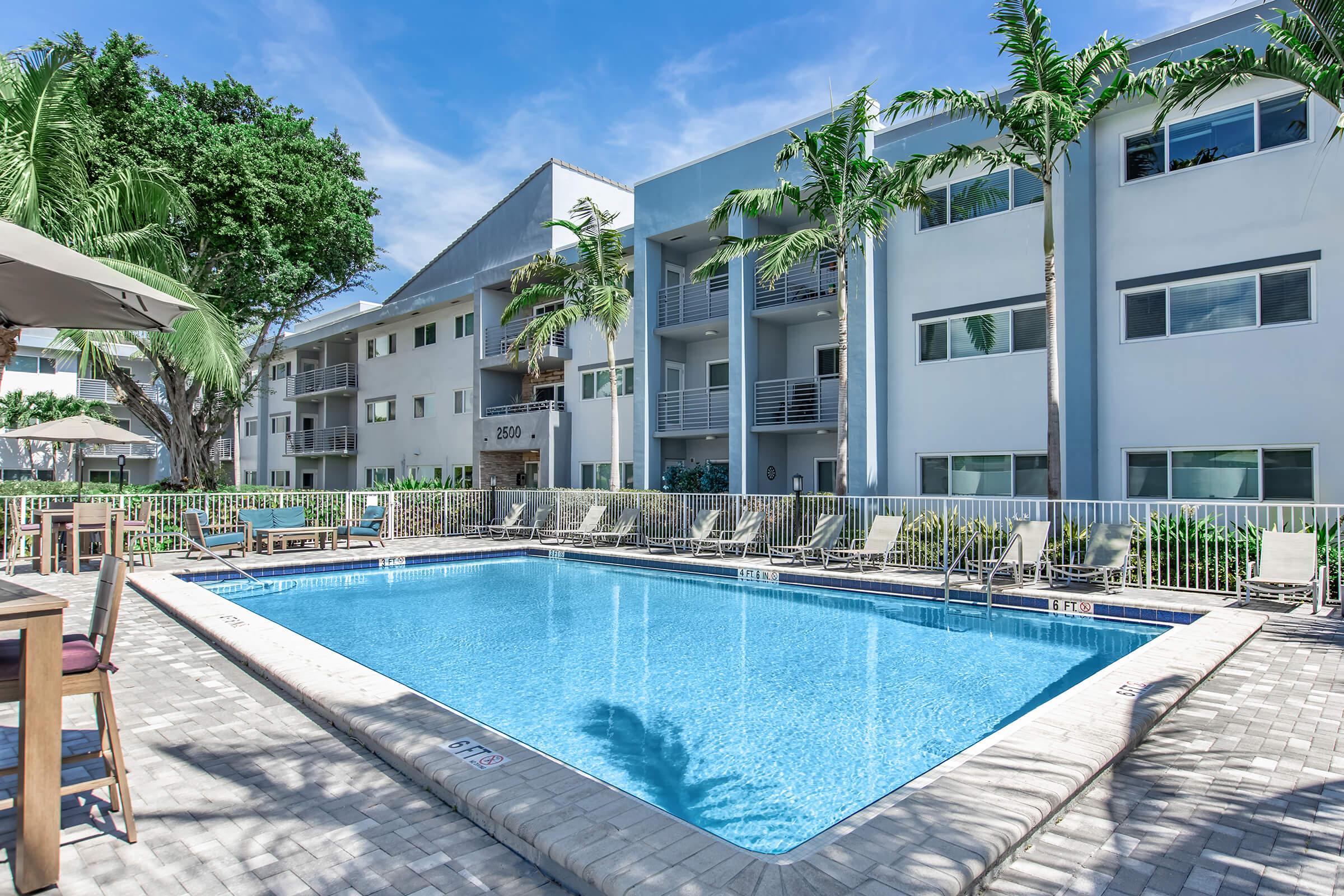 a pool next to a building