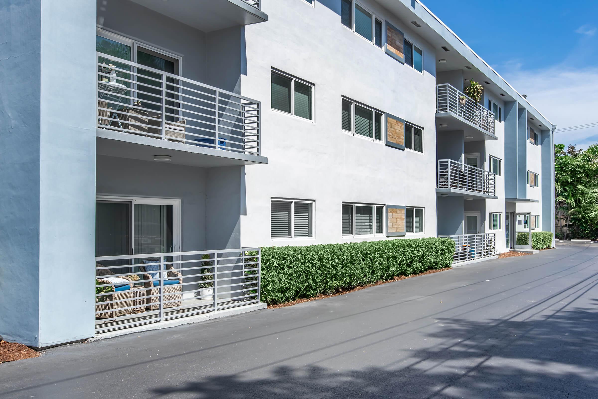 a close up of a street in front of a building