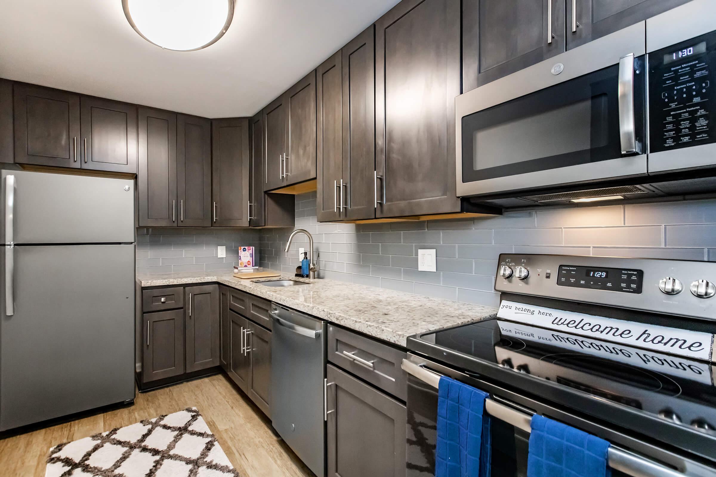 a modern kitchen with stainless steel appliances