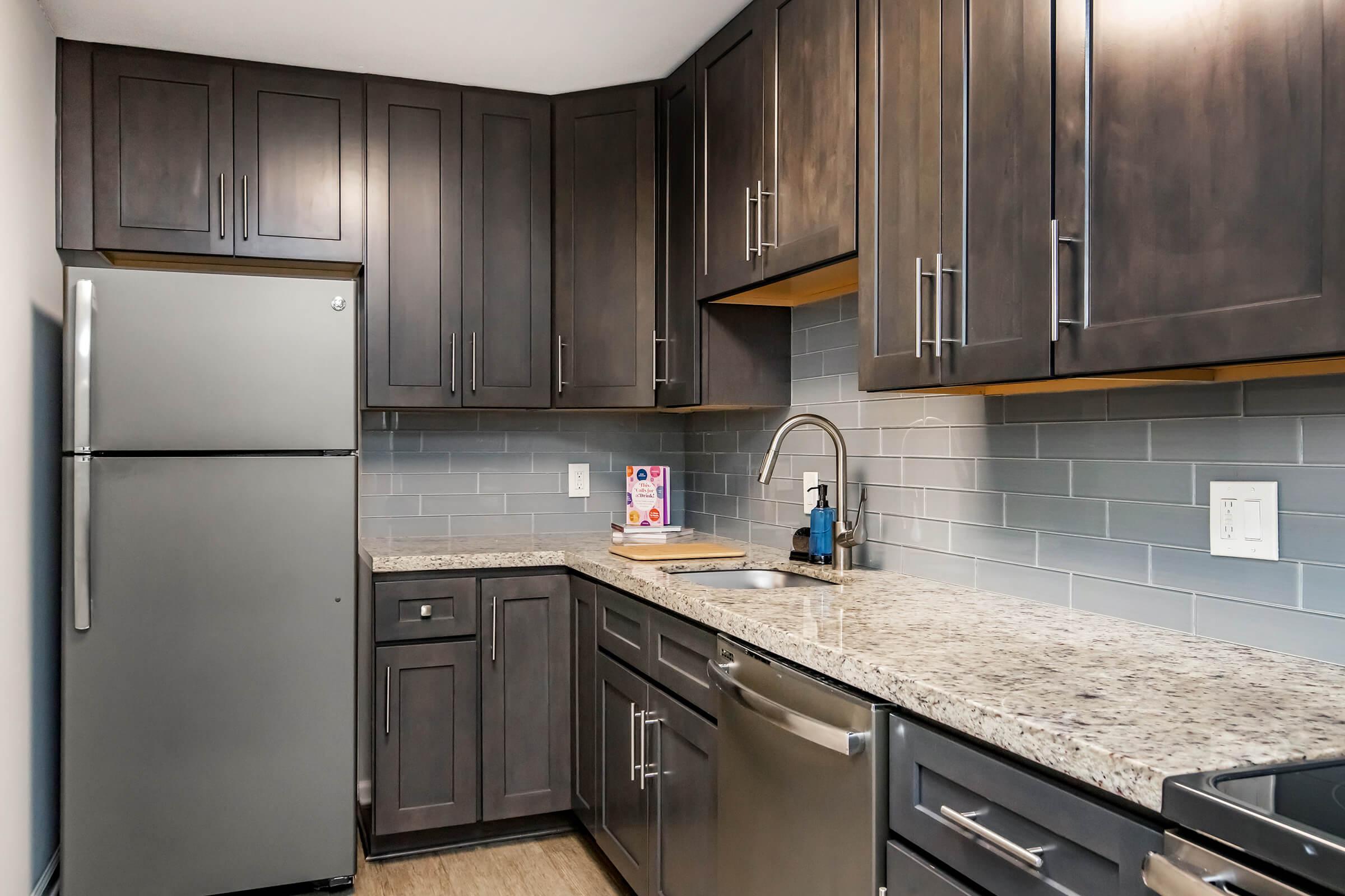 a modern kitchen with stainless steel appliances