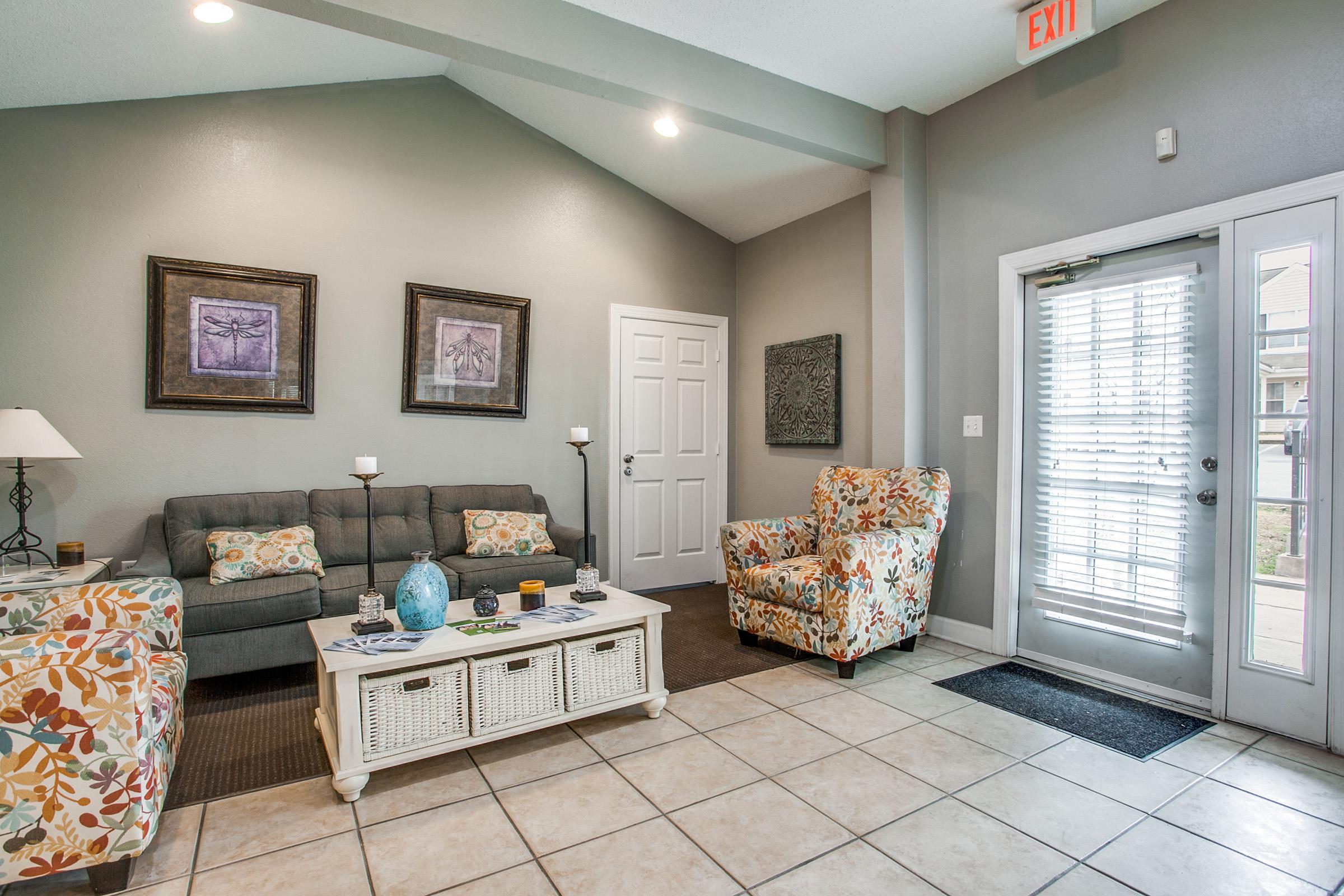 a living room filled with lots of furniture