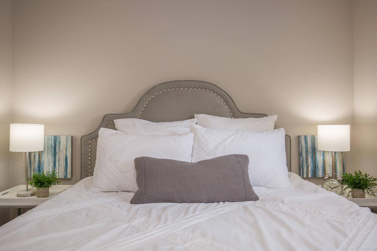 a made bed in a hotel room