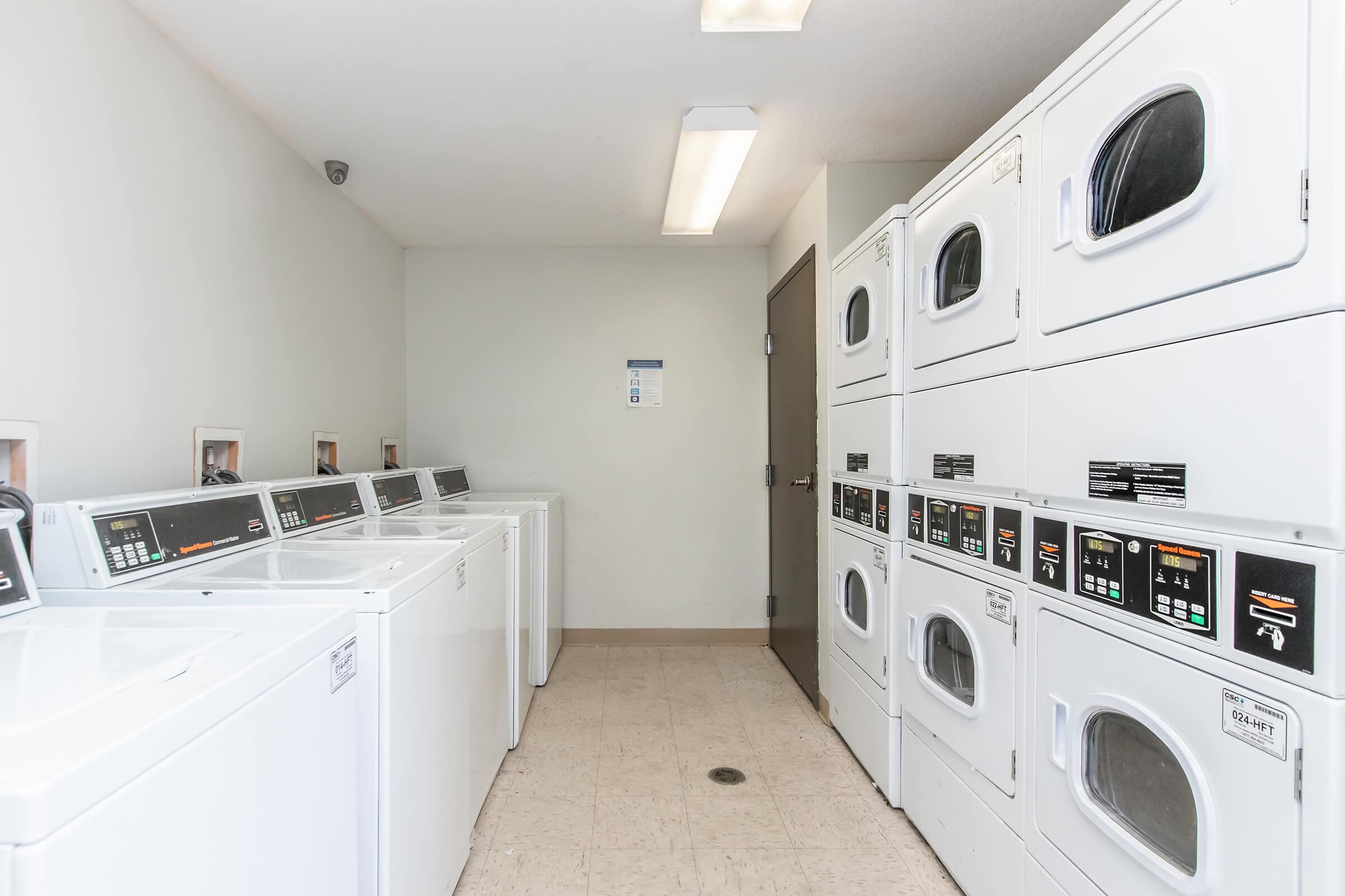 a kitchen with a sink and a microwave