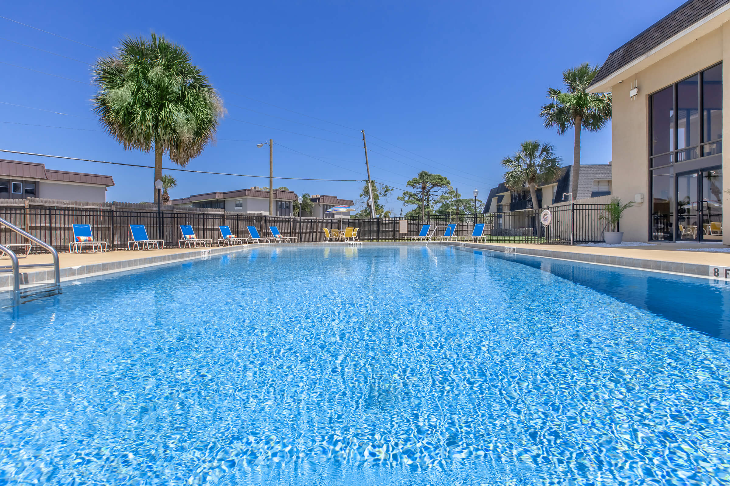 a pool next to a body of water