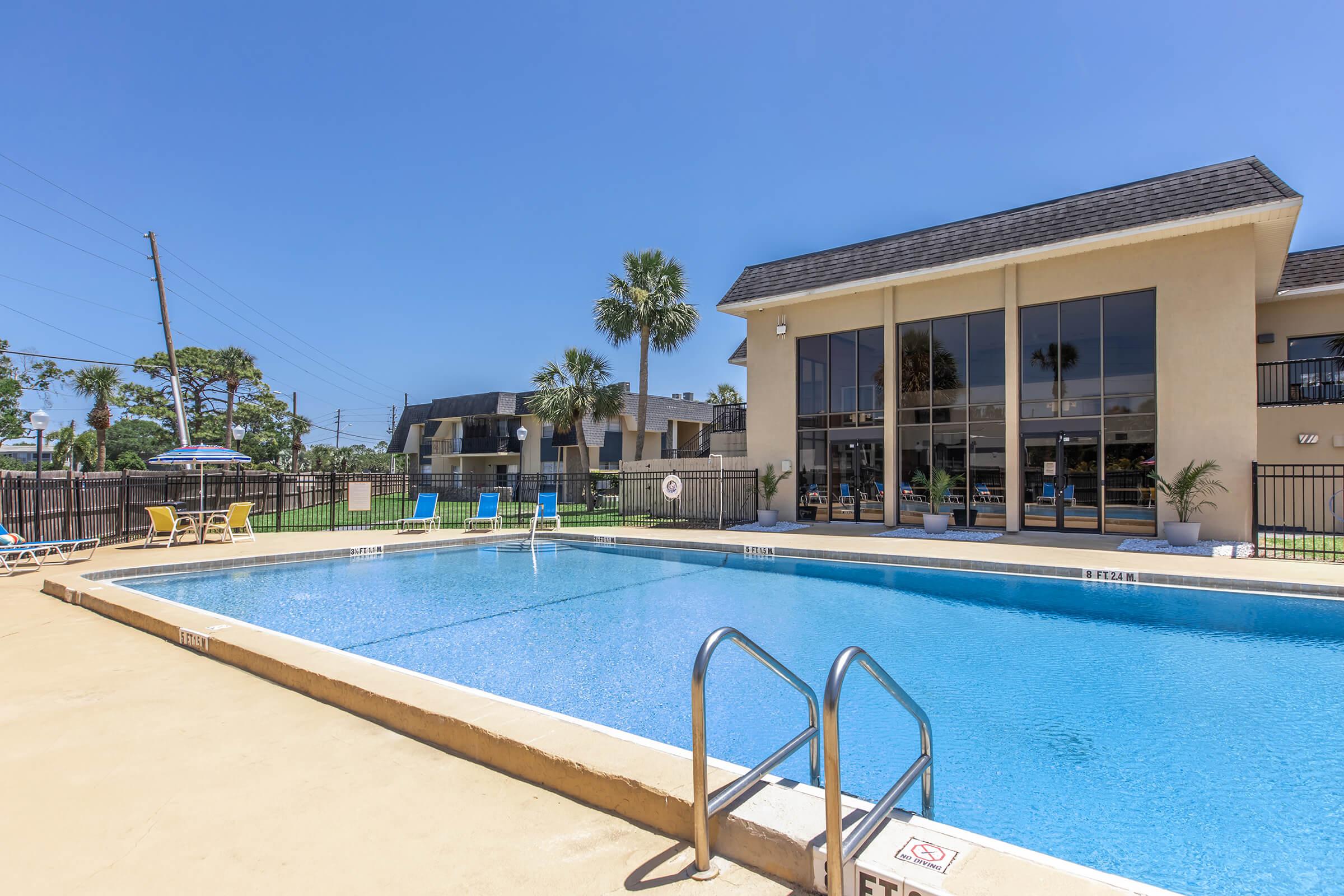 a pool next to a body of water