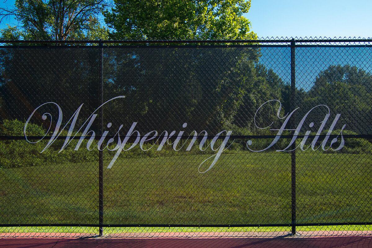 Whispering Hills Apartments in Creve Coeur, MO - Tennis Court 02.jpg