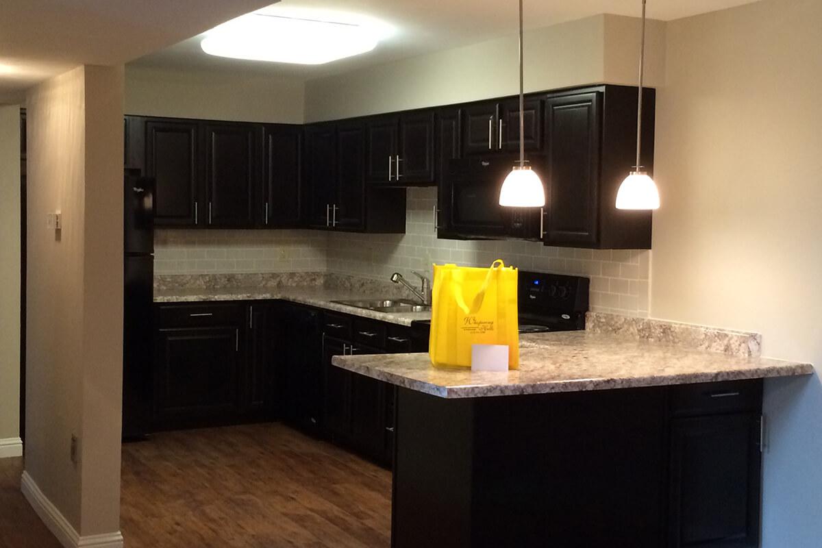 Whispering Hills Apartments in Creve Coeur, MO - Interior 00-4.jpg
