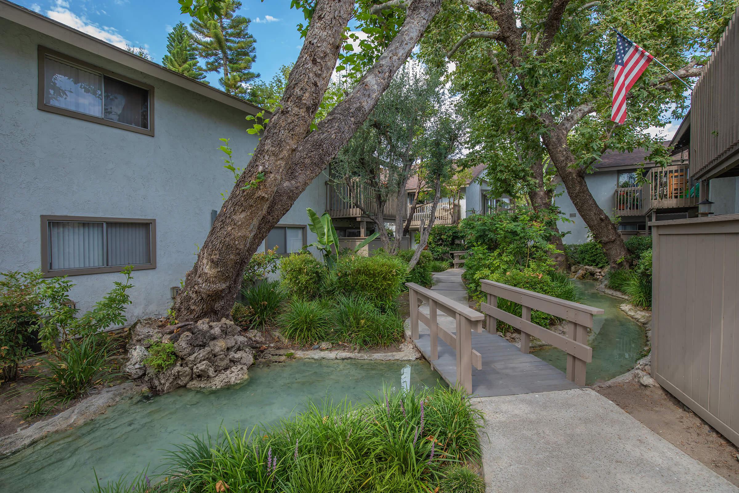 a bridge over the community creek