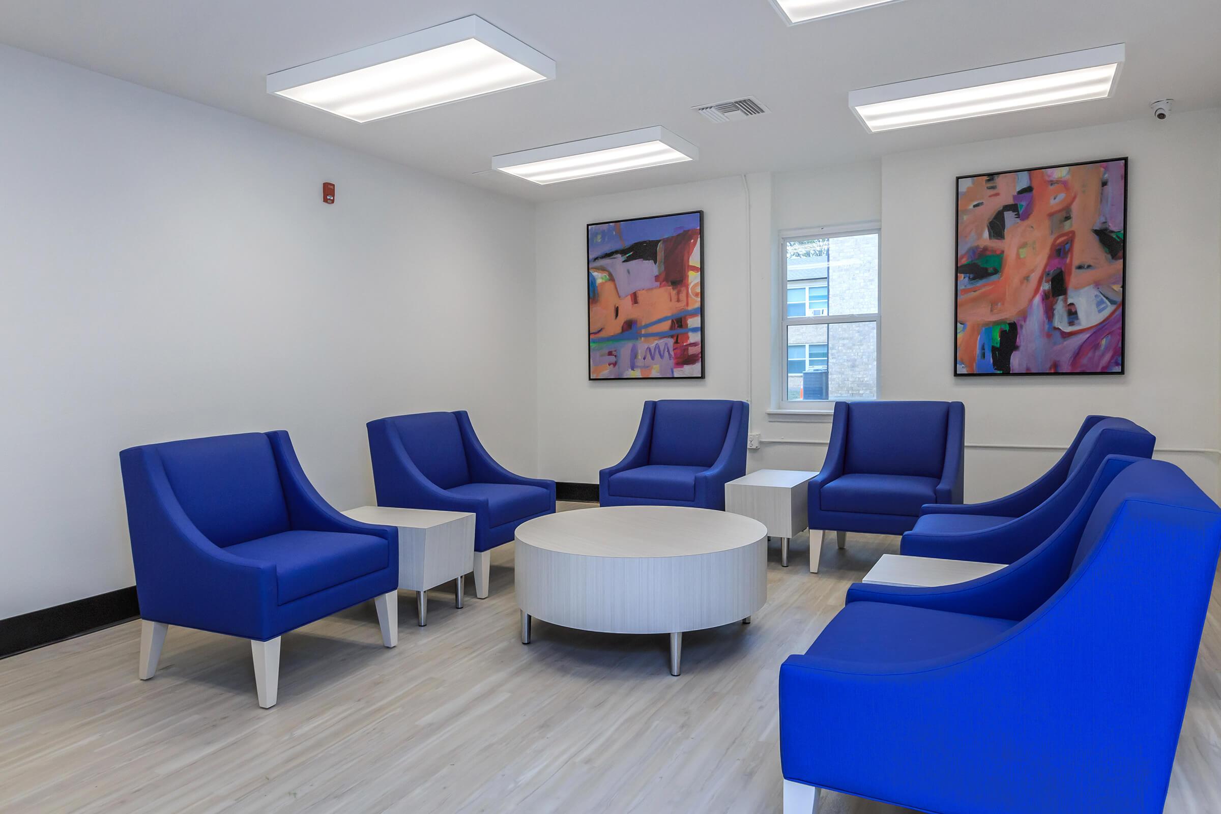 Community room with blue chairs