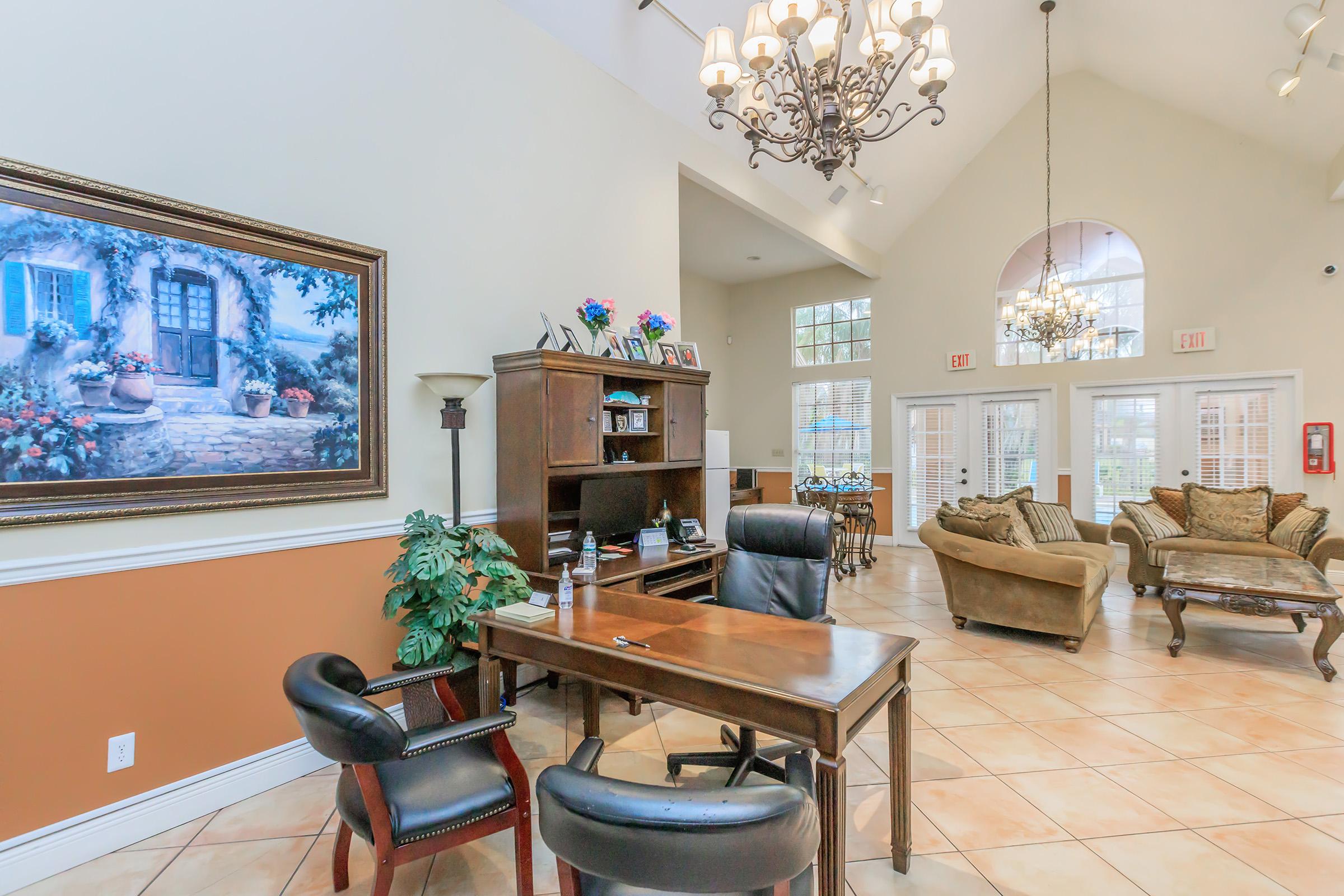 a room filled with furniture and a fireplace