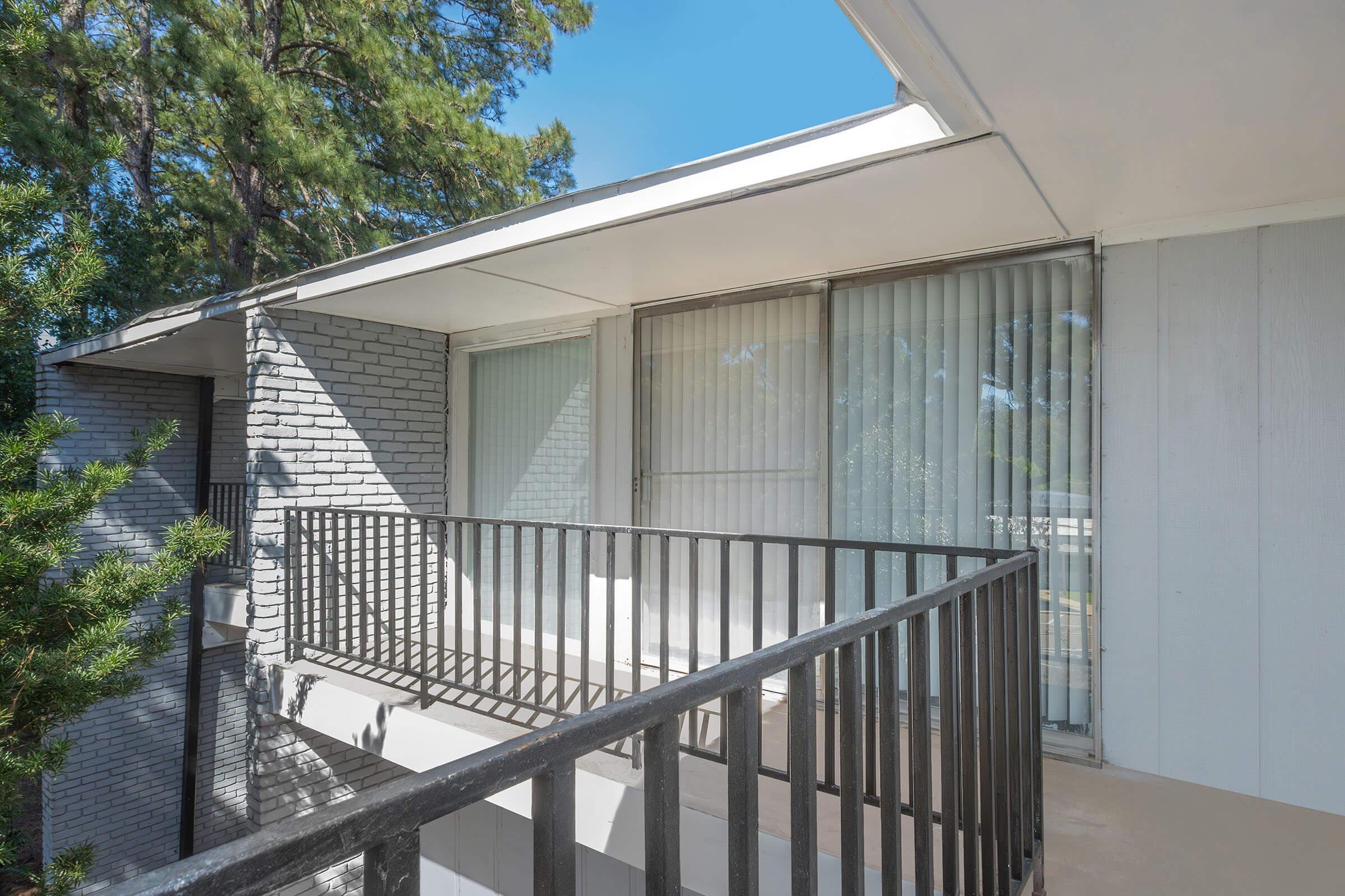 a house with a wooden fence