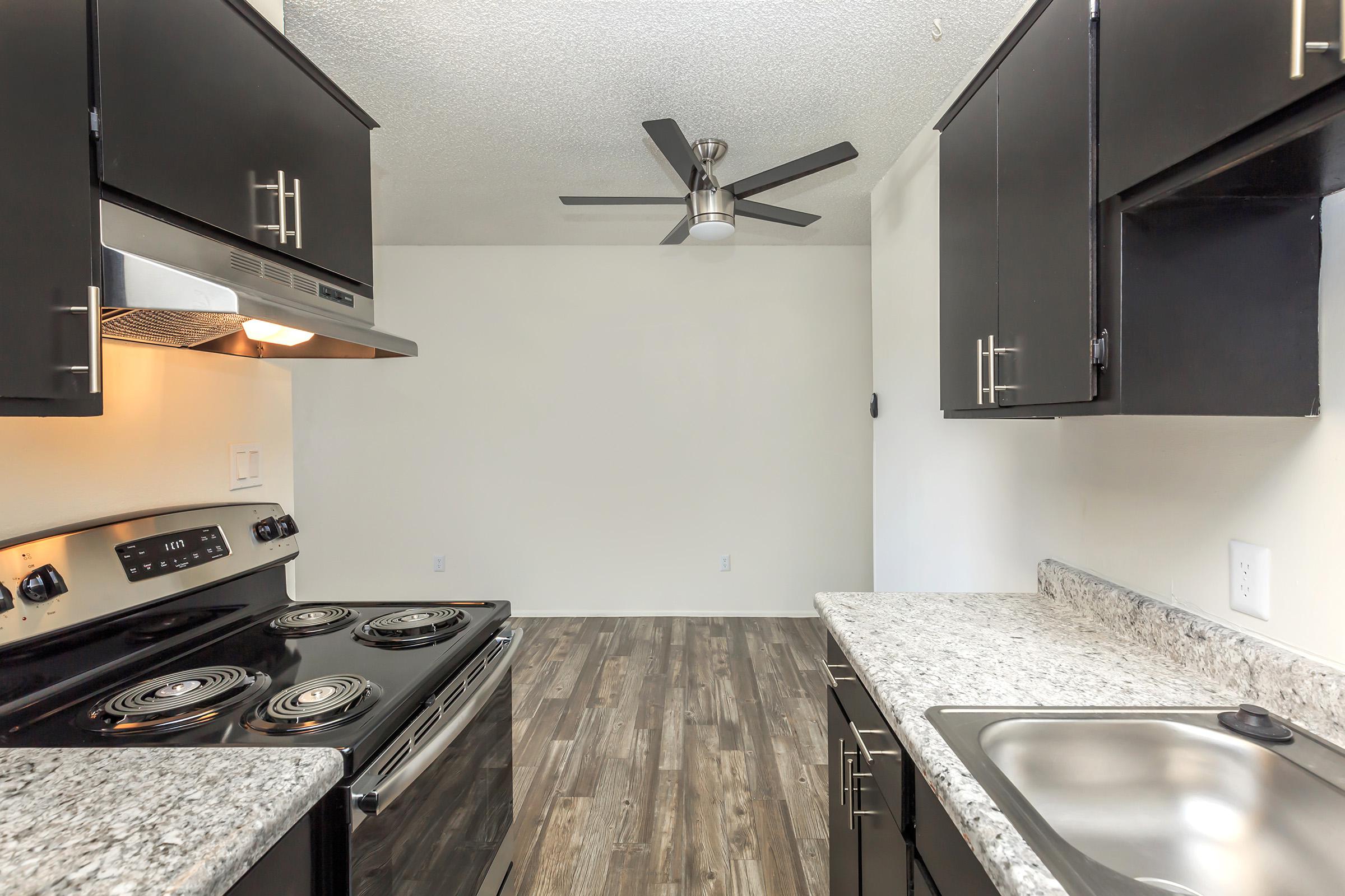 a modern kitchen with stainless steel appliances