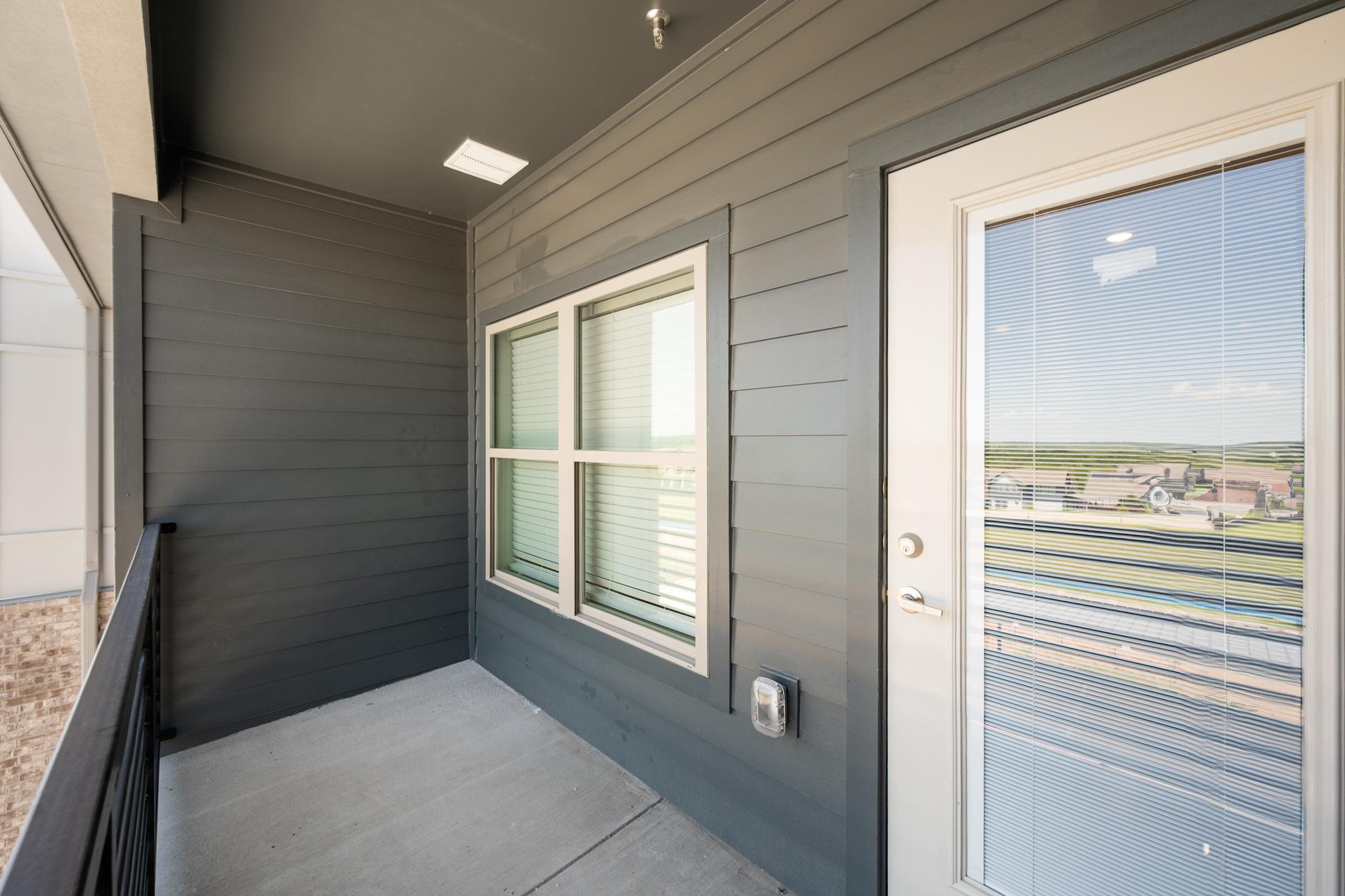 Private balcony in the A3 unit providing outdoor space for relaxation and fresh air.
