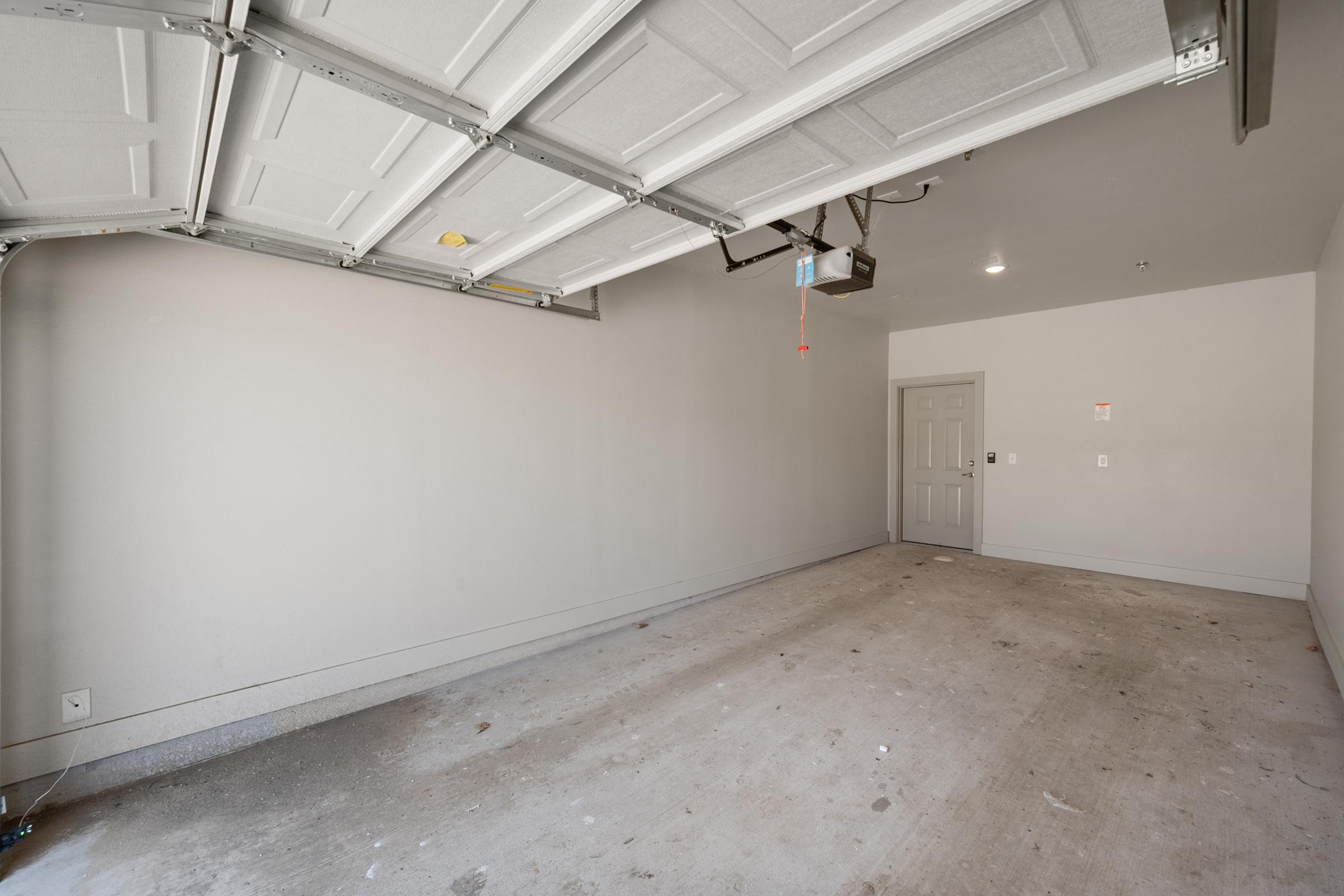 Attached private garage in the A4 Floor Plan with direct access to the home, offering secure parking and convenience.