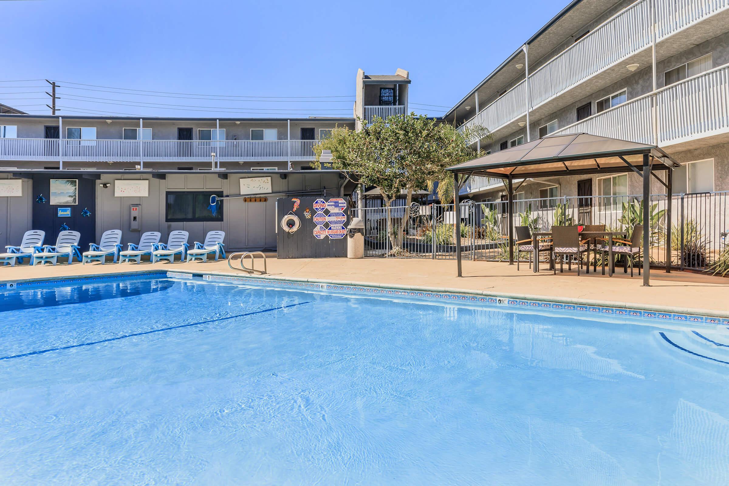 a pool next to a building