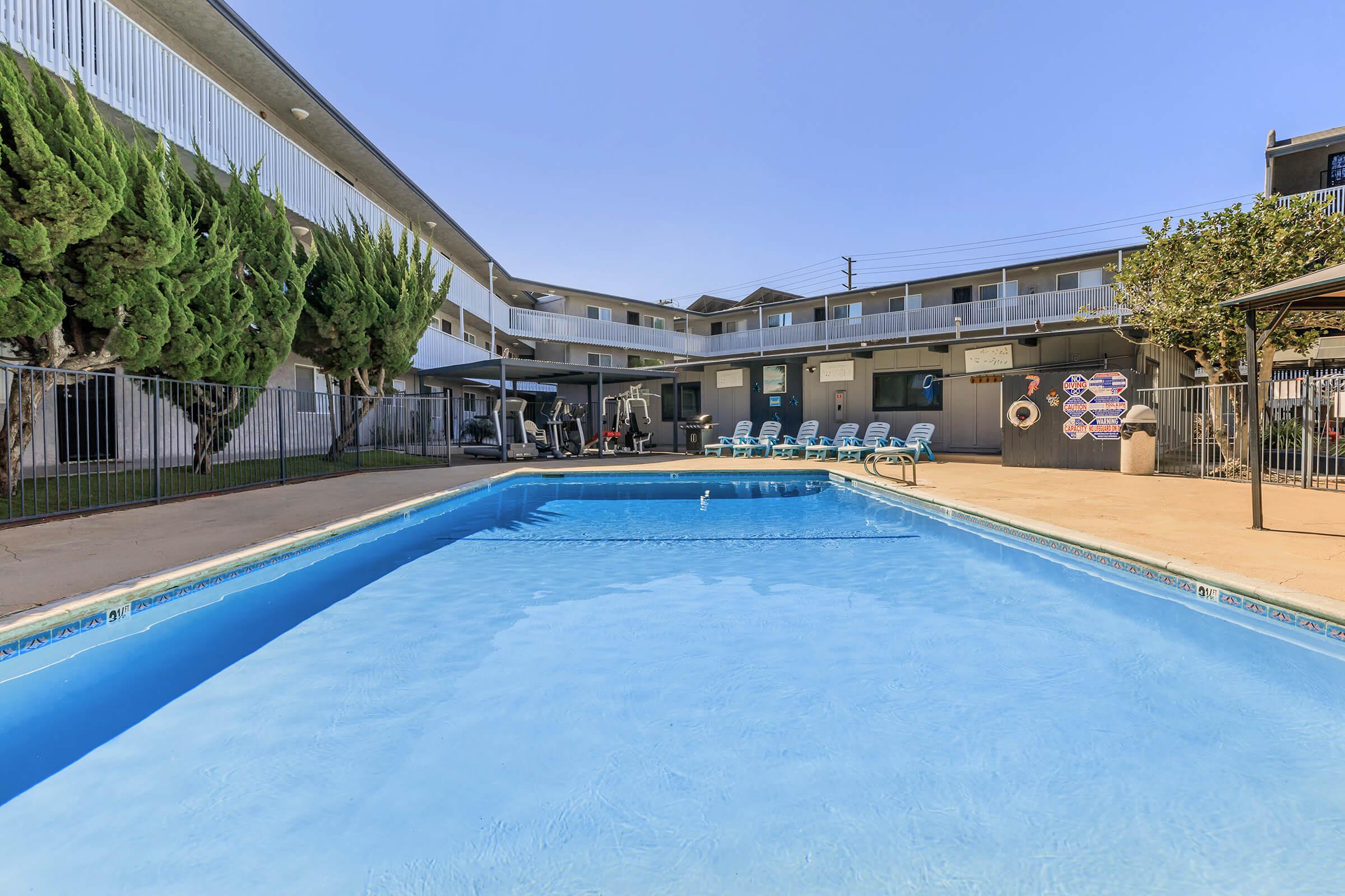 a pool next to a building