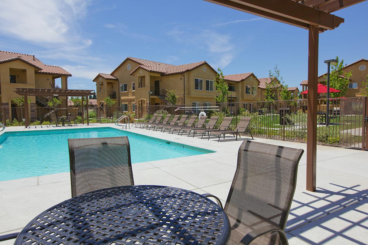 Enjoy the inviting pool area in Villa Siena Apartments