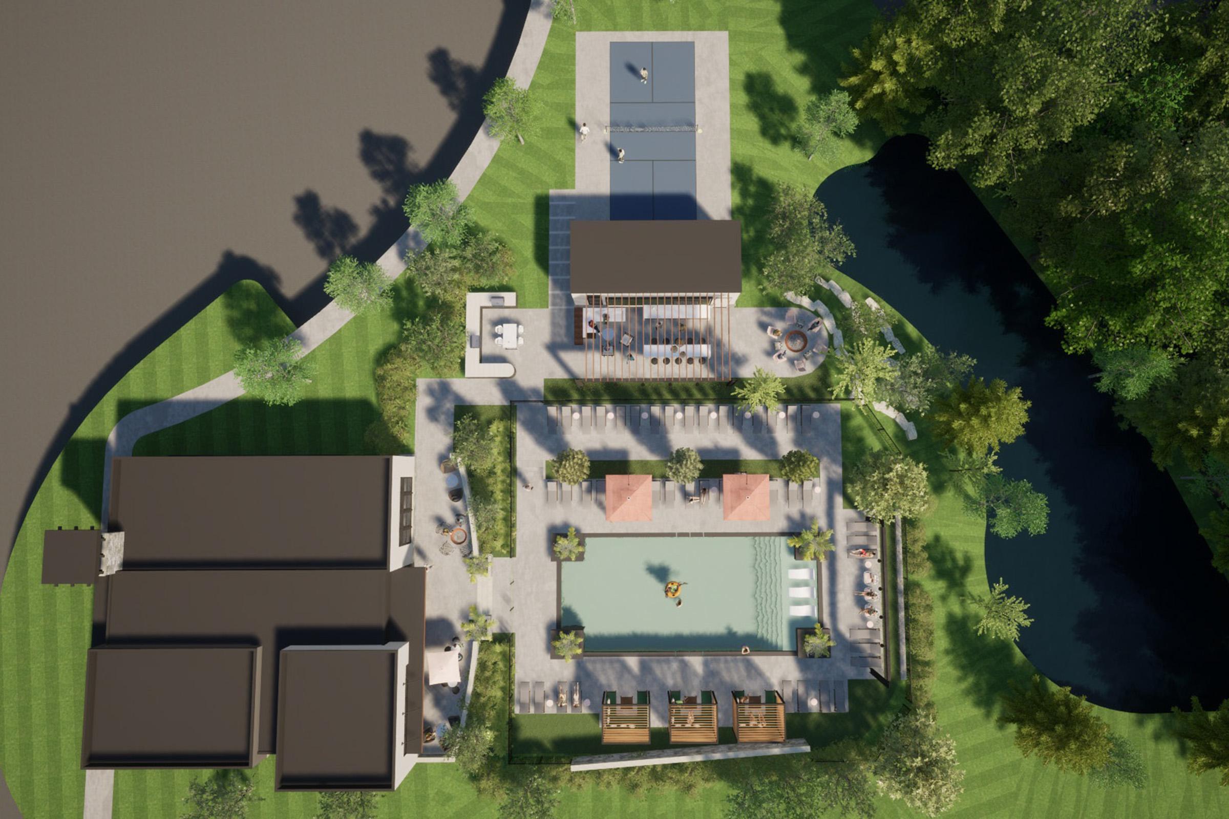 An aerial view of a landscaped resort layout featuring a central pool surrounded by lounge areas and cabanas, with seating arrangements. Nearby, there are recreational facilities, a tennis court, and a luxurious building structure, all set amidst lush greenery and a tranquil water feature.